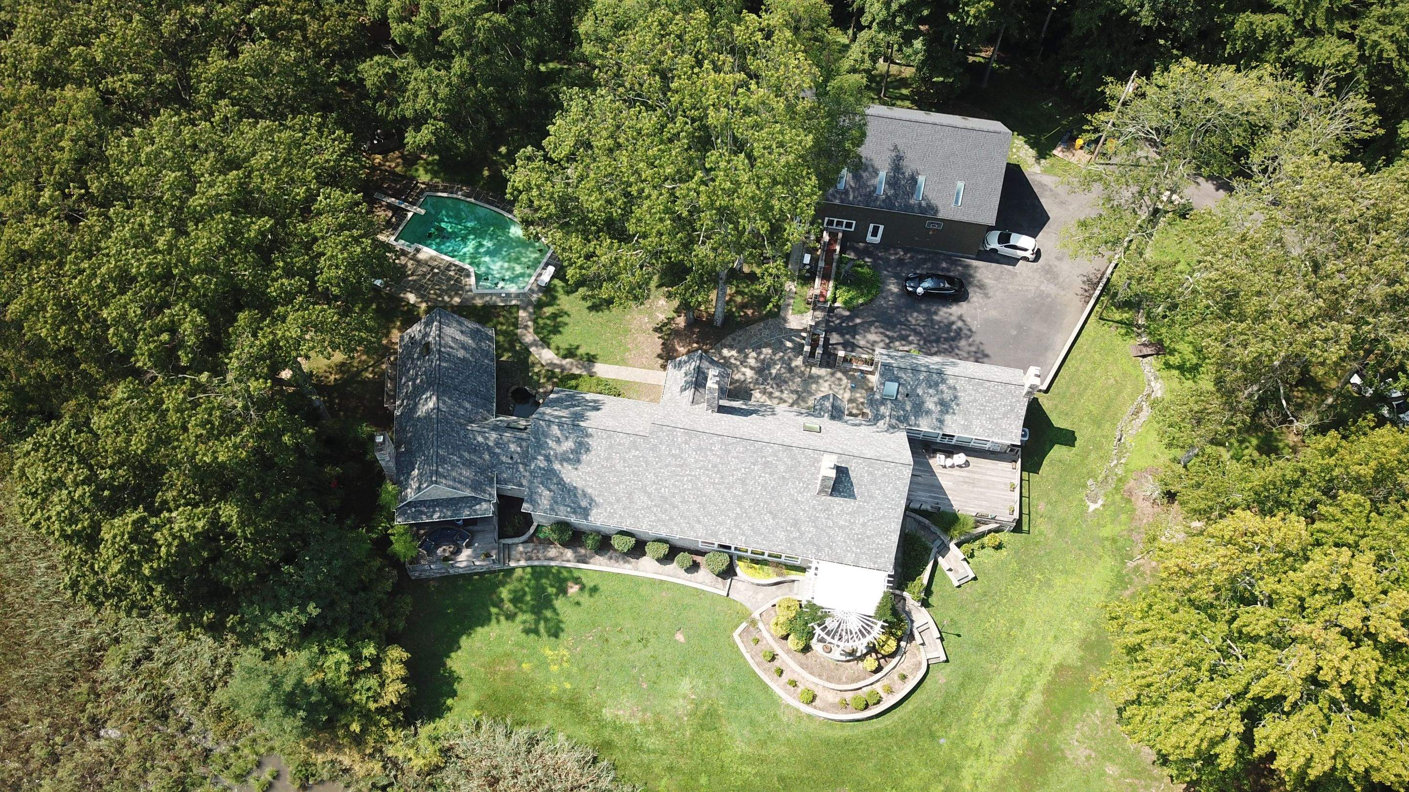 Roof Replacement using IKO Dynasty by American Home Contractors