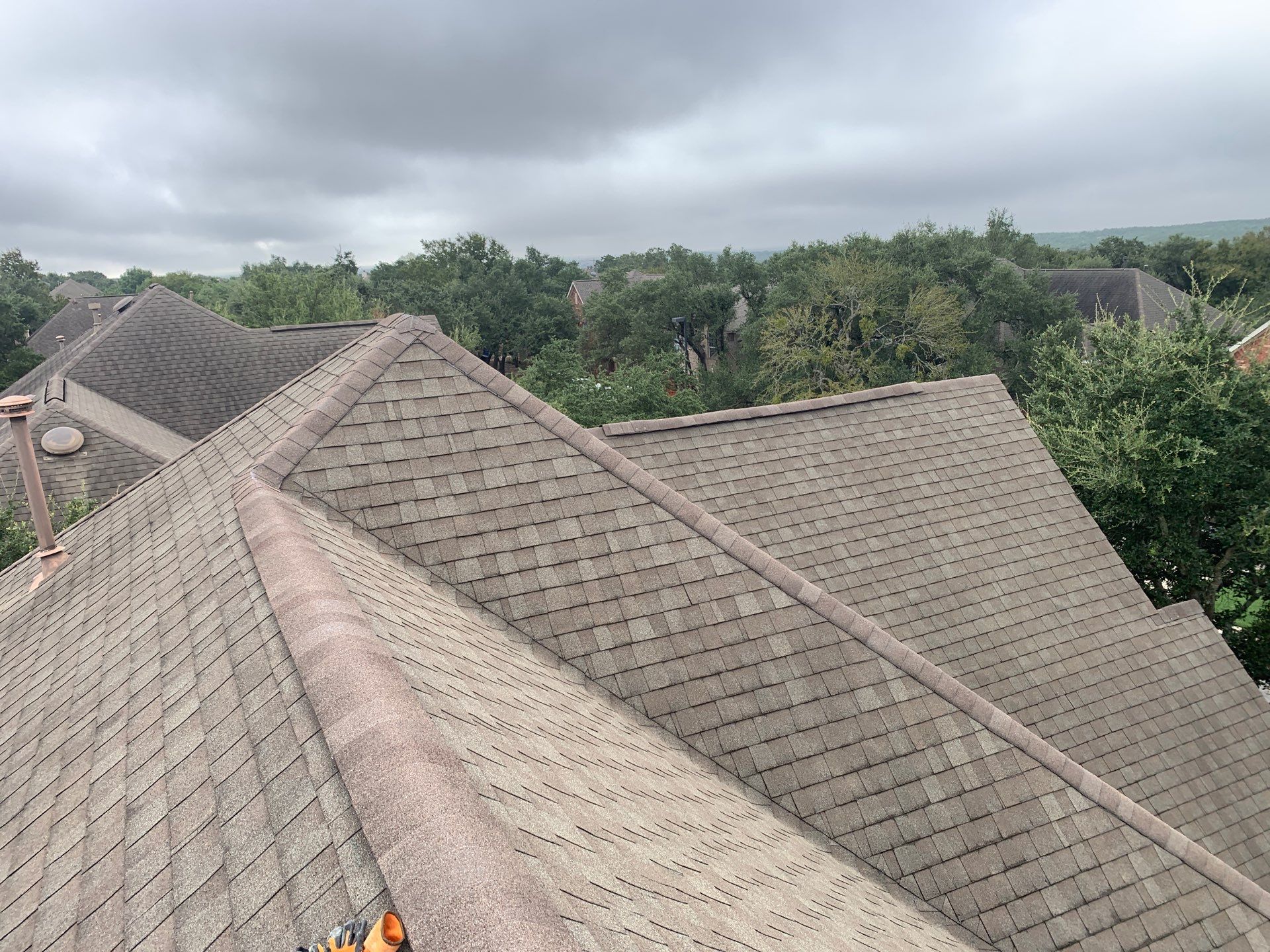 Hail Damage Restoration and Asphalt Shingle Roof Replacement in Austin by Caliber Restoration LLC