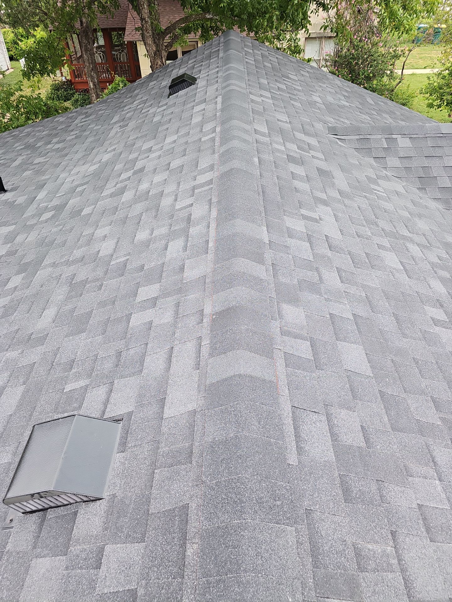 Residential Roofing Installation using Owens Corning Oakridge Onyx Black by DeZign Roofing & Exteriors