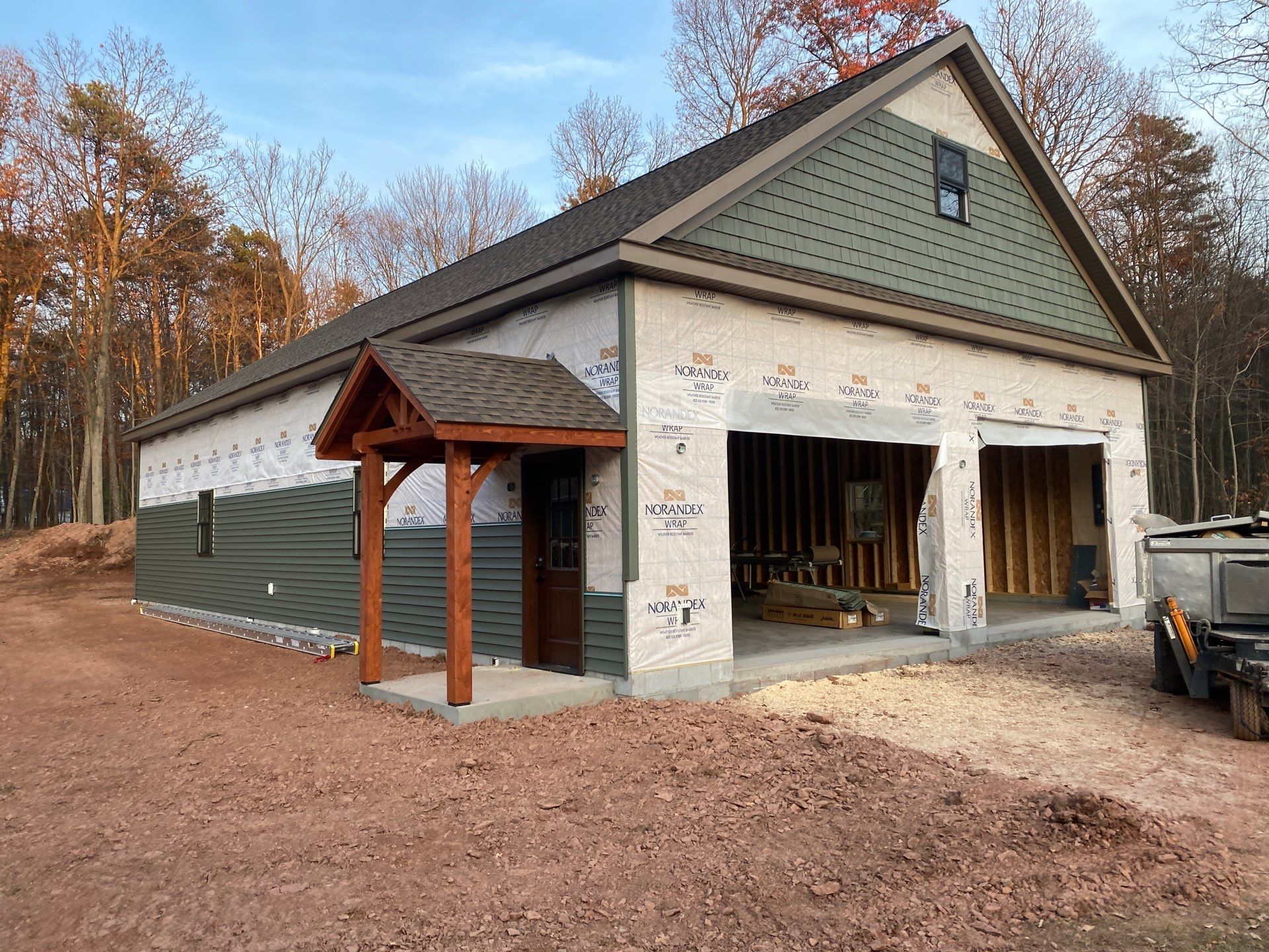 Custom Two-Story Garage with Finished Upper Leve by Esh Builders