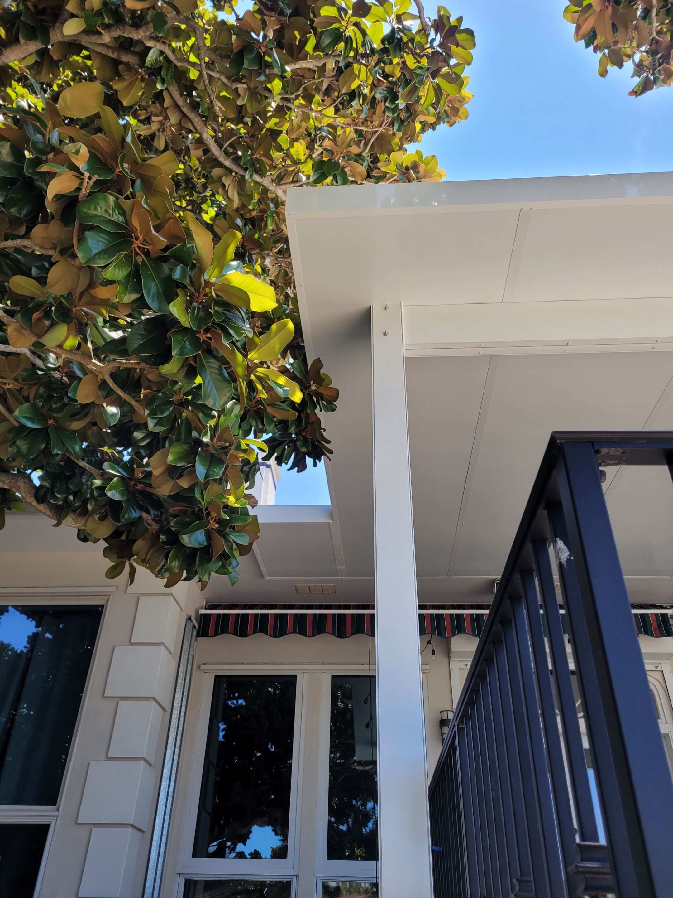 Poolside Colorbeam Patio Cover in Gulf Breeze by Titan Sunrooms