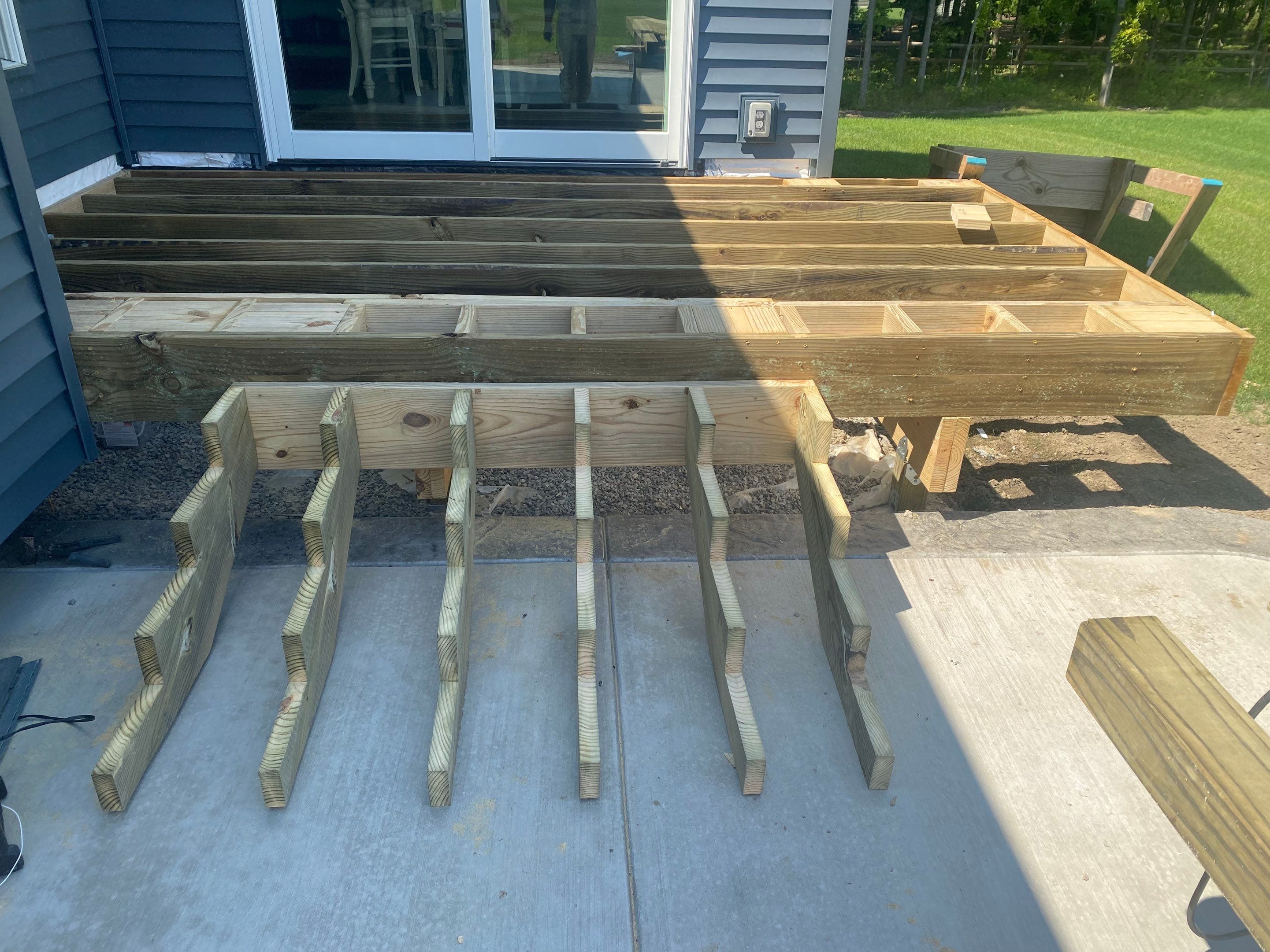 Outdoor Living- Deck and Concrete by Ivy Lea Construction