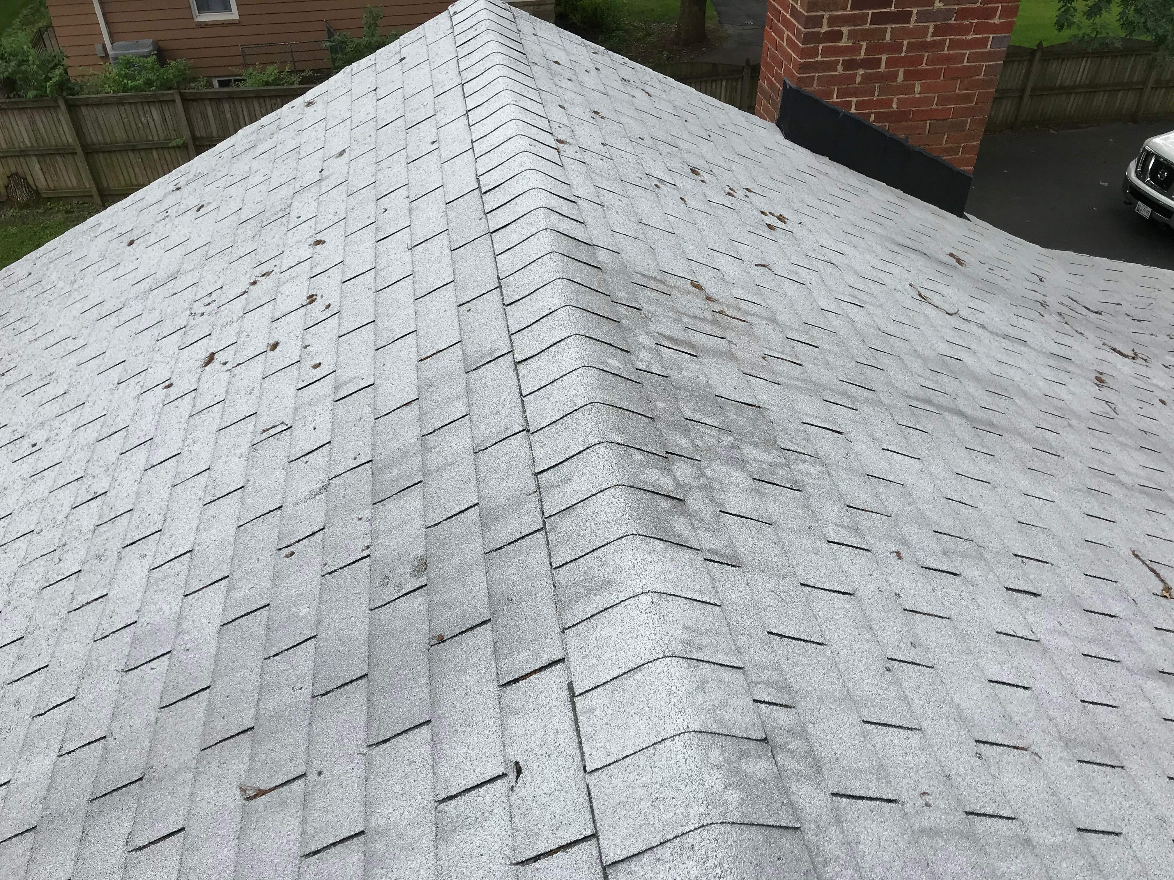 Residential Roofing Installation using Charcoal Black by Alpha Design Services