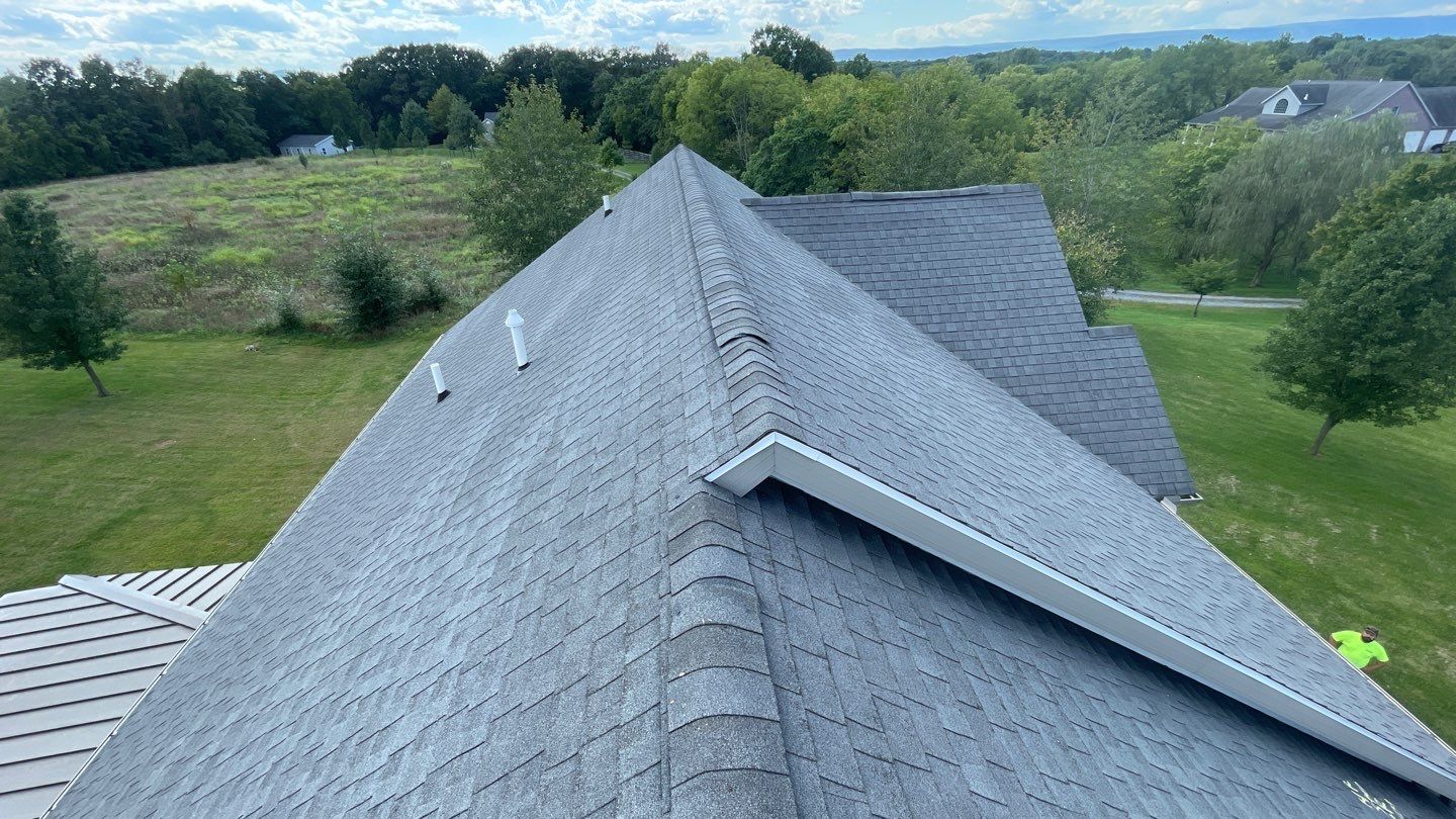 Roof Damage using Certainteed Lifetime Roofing System- Moire Black Landmark Pro shingkes with shadow ridge caps. by BulletpROOF Exteriors