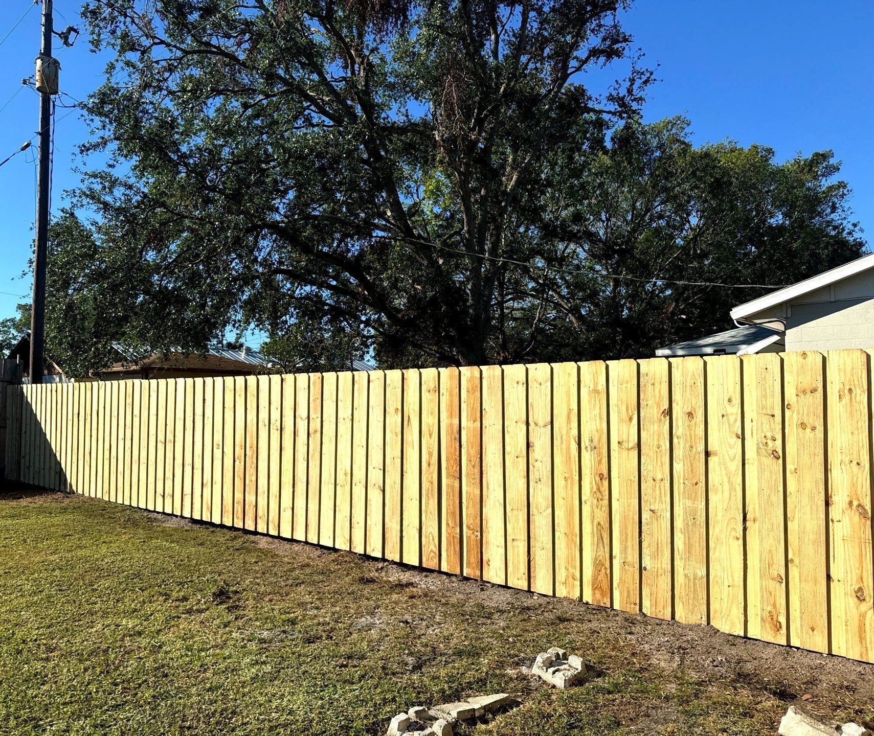 Wood Fence Installation using 6Ft Pressure Treated Wood Board On Board Privacy Fence by Asap fence and gates, LLC