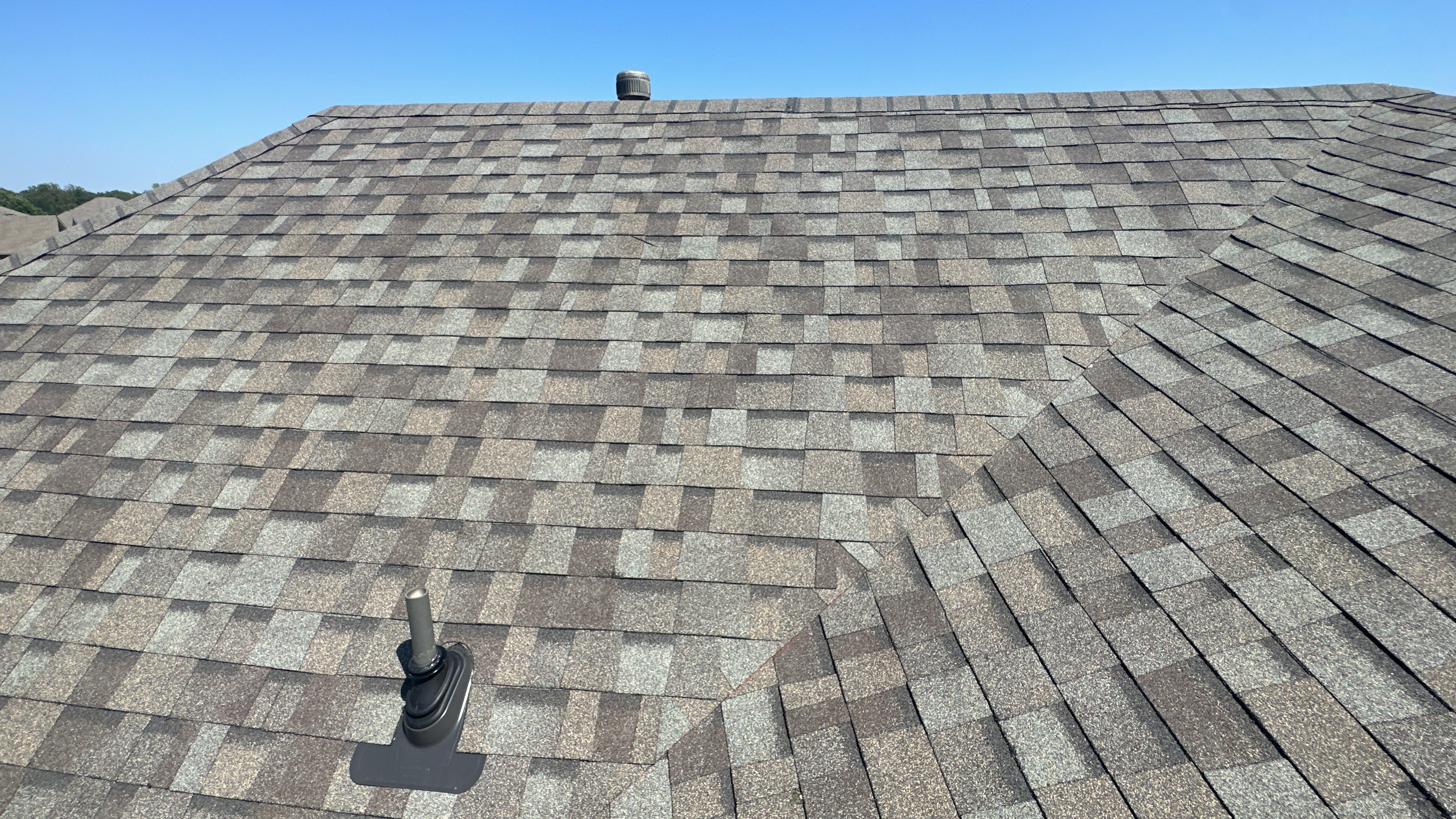 Reroof using Owens Corning Duration Storm IR in Driftwood by Castillo Roofing