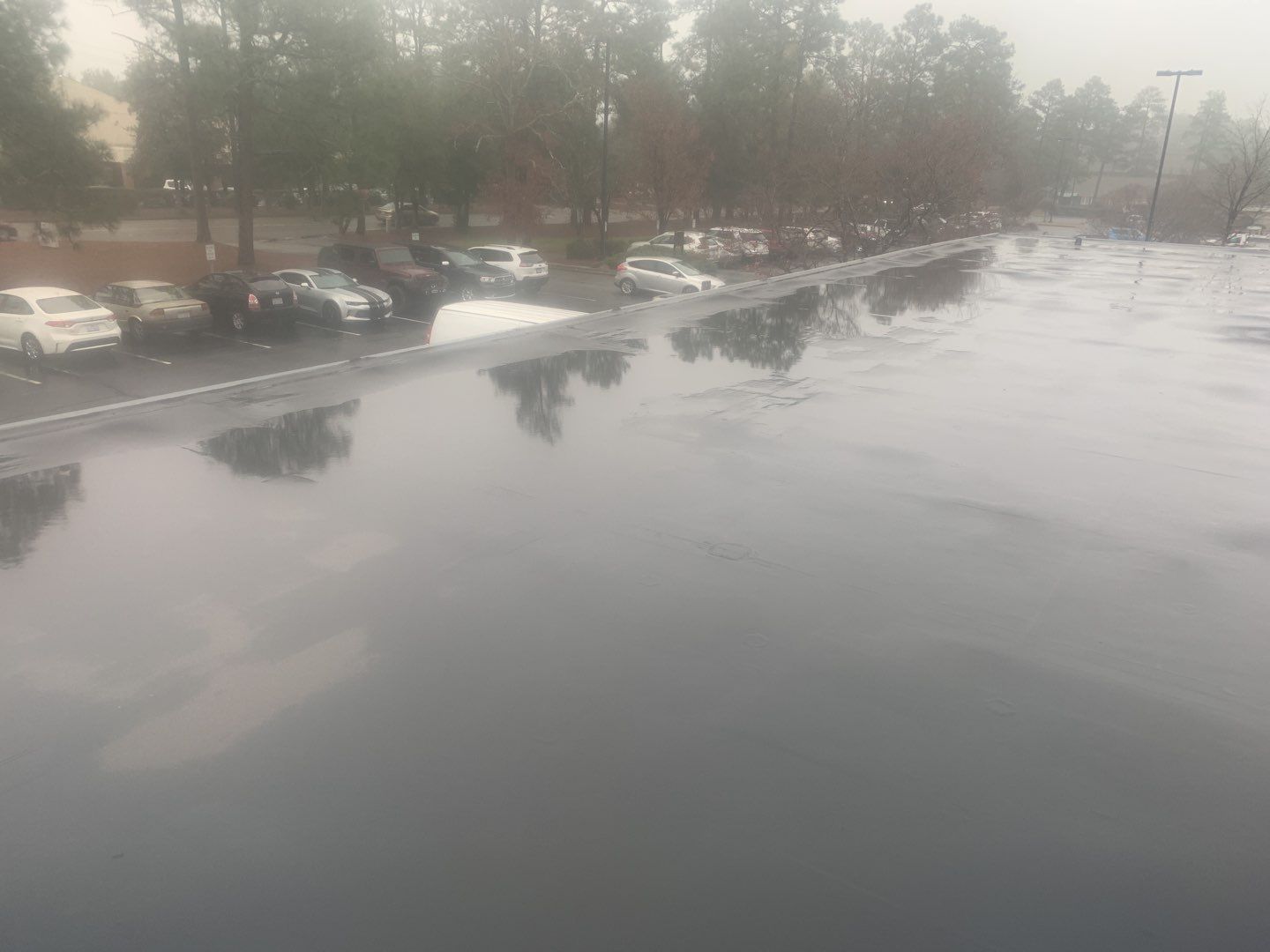 Re Roof (TPO) by American Roofing NC