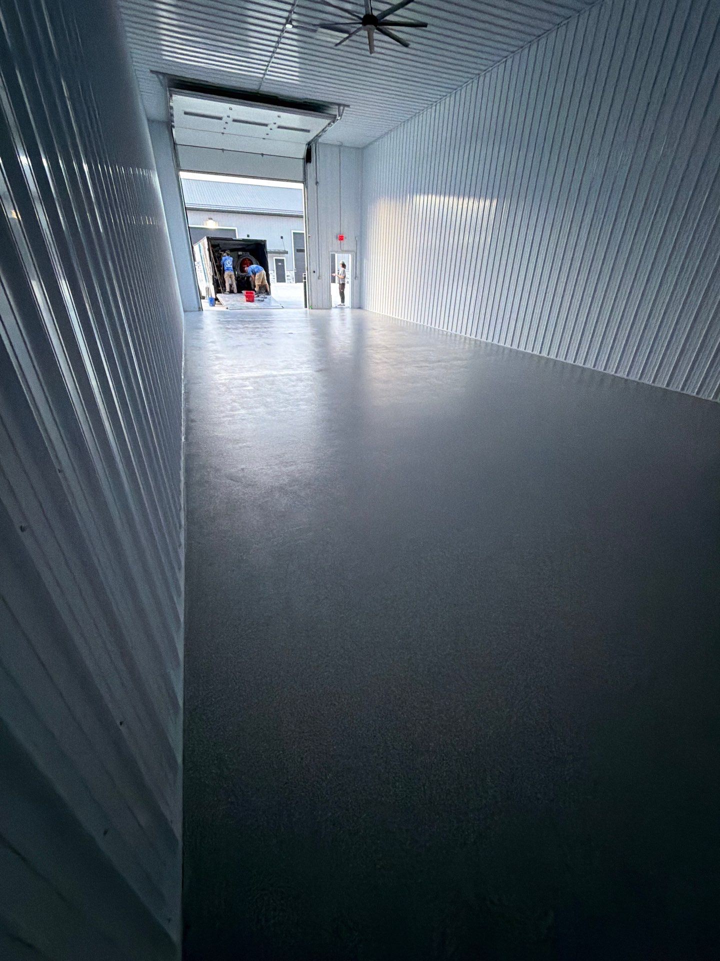 Commercial Storage Bay Epoxy Flake Floor Installation in North Muskegon by Gordon Painting
