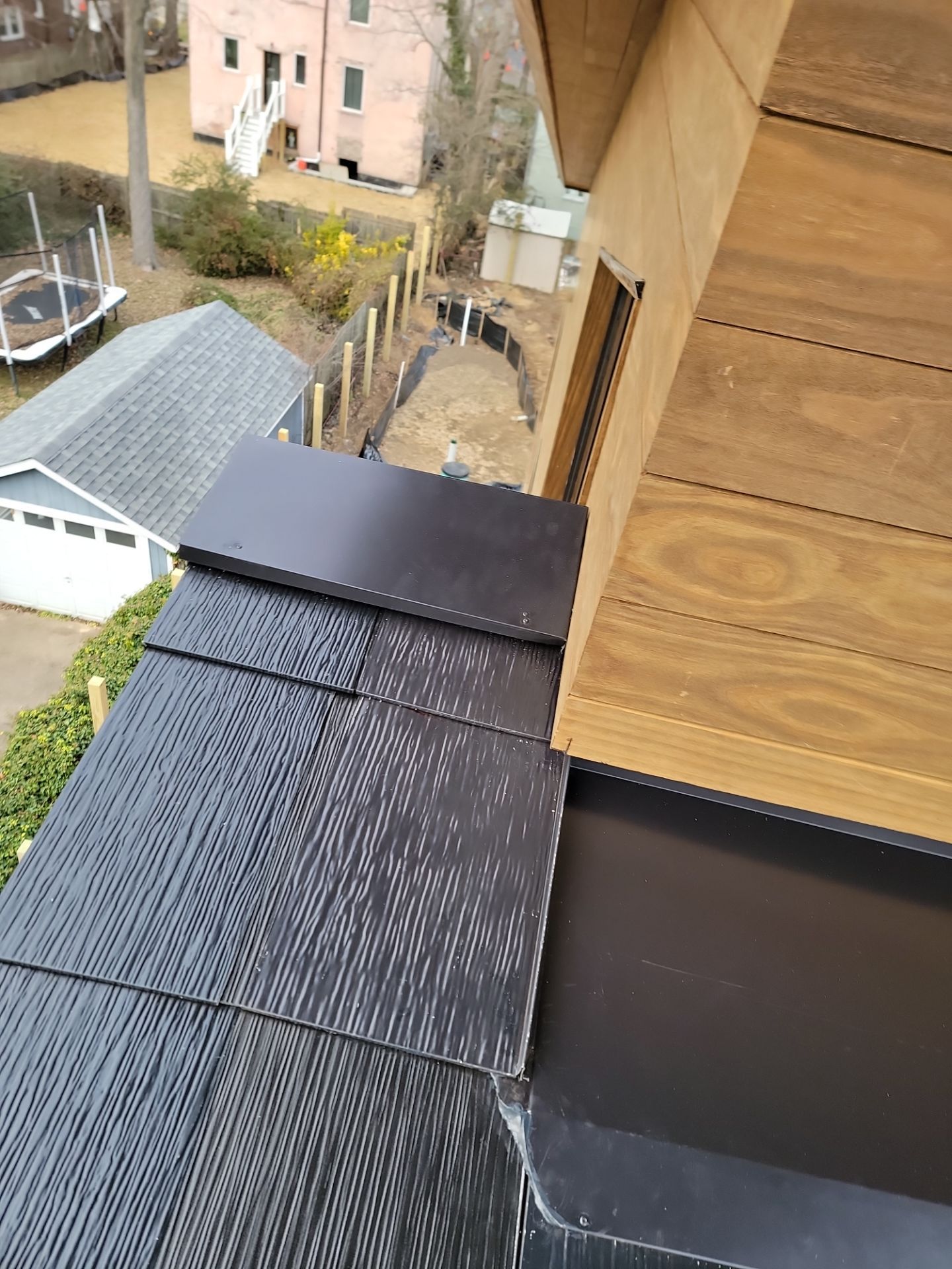 Tesla Solar Roof using SPAN smart electrical panel by American Home Contractors