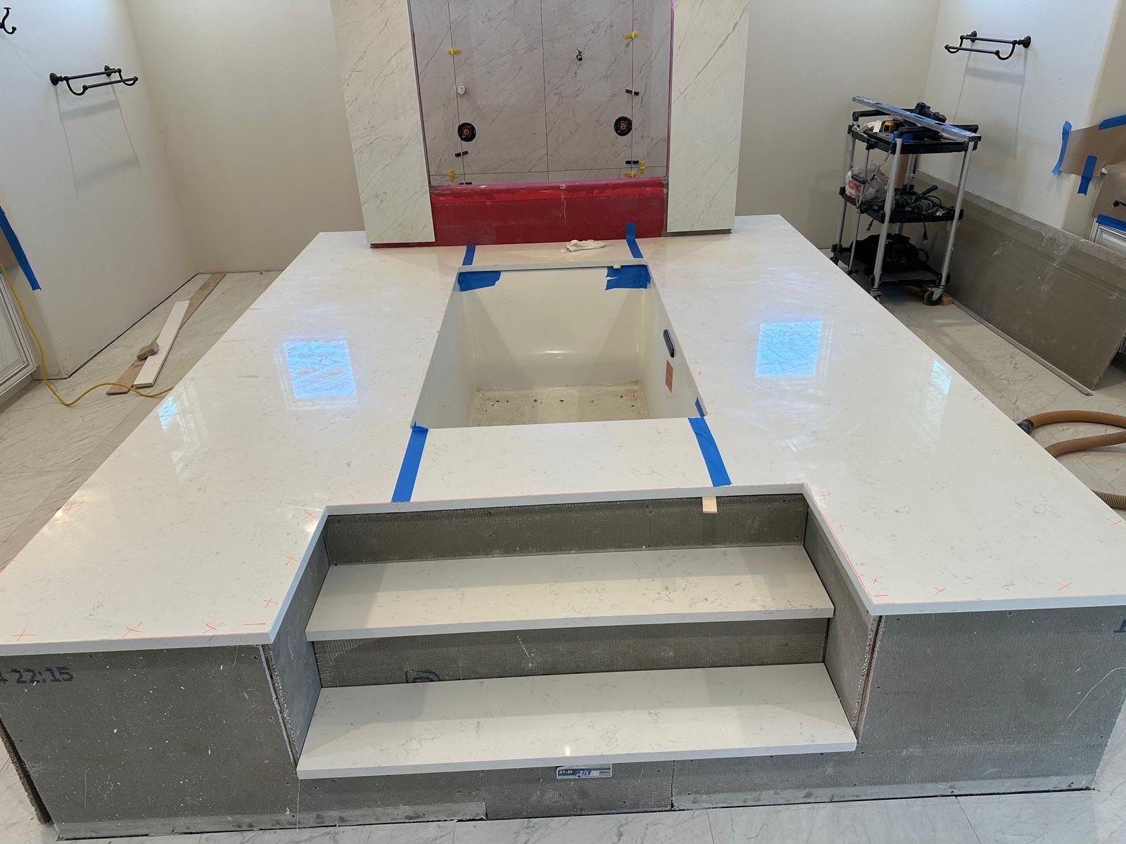 Kitchen and Bathroom Remodel Featuring Custom Stone and Tile in Mico by Mena stone surfaces