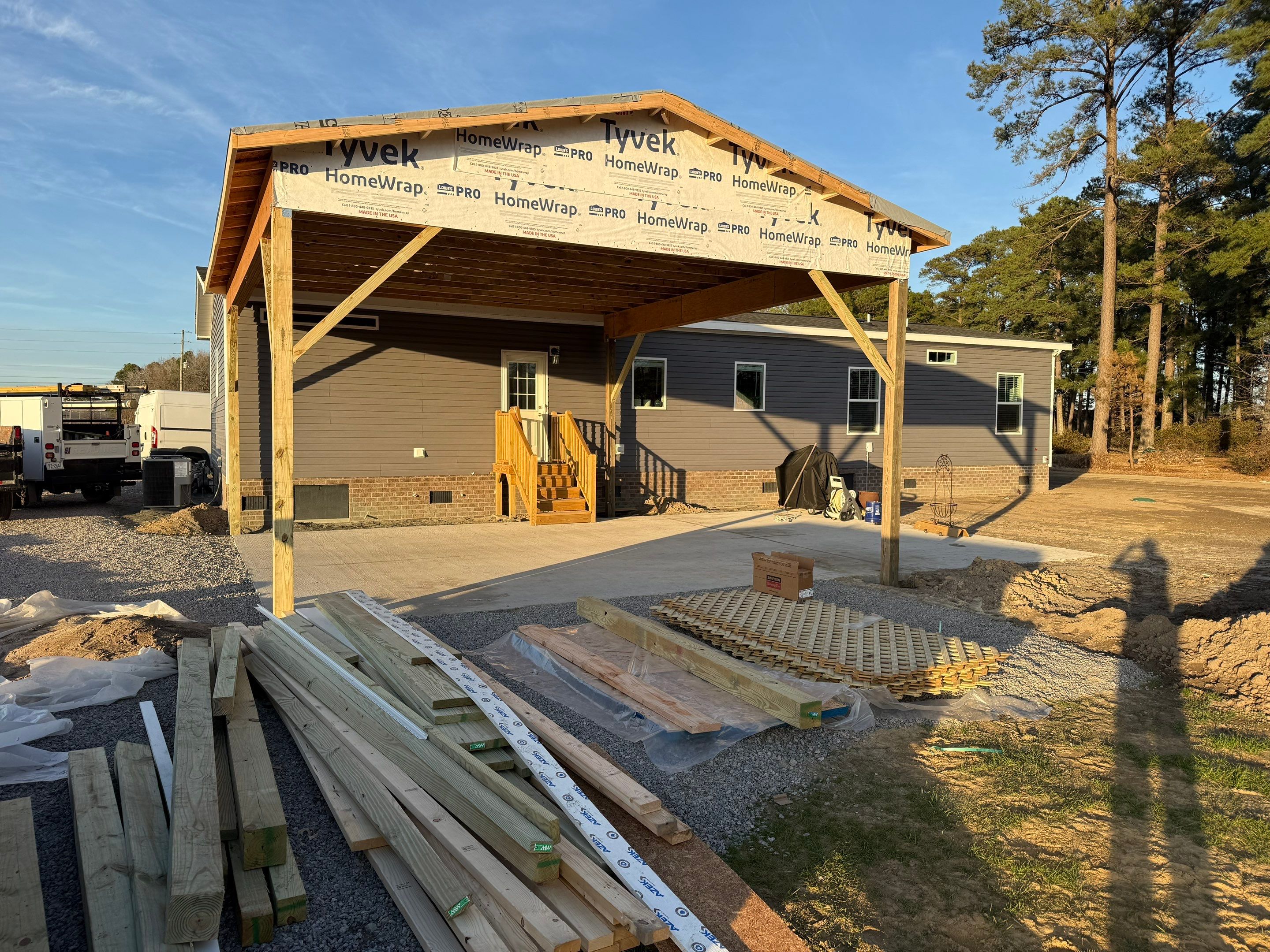 Custom Trex Covered Deck and Gabled Roof in Winterville by The Remodeling Company