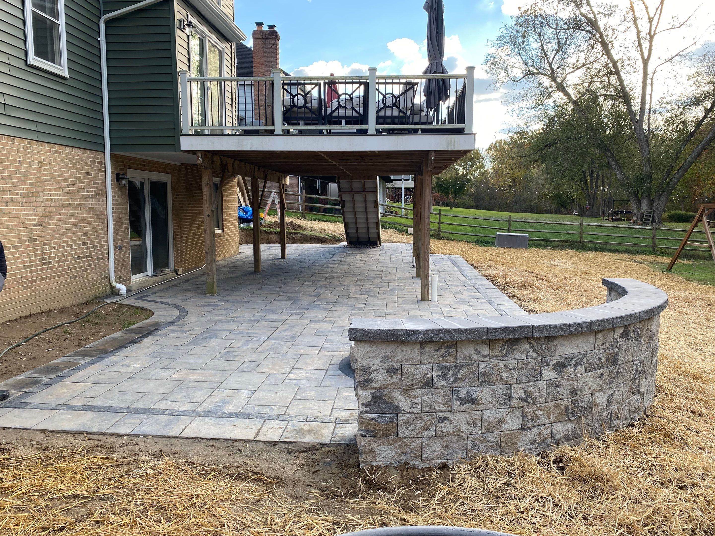 Backyard Transformation using Techo-Bloc Pavers by The Smet Companies, LLC