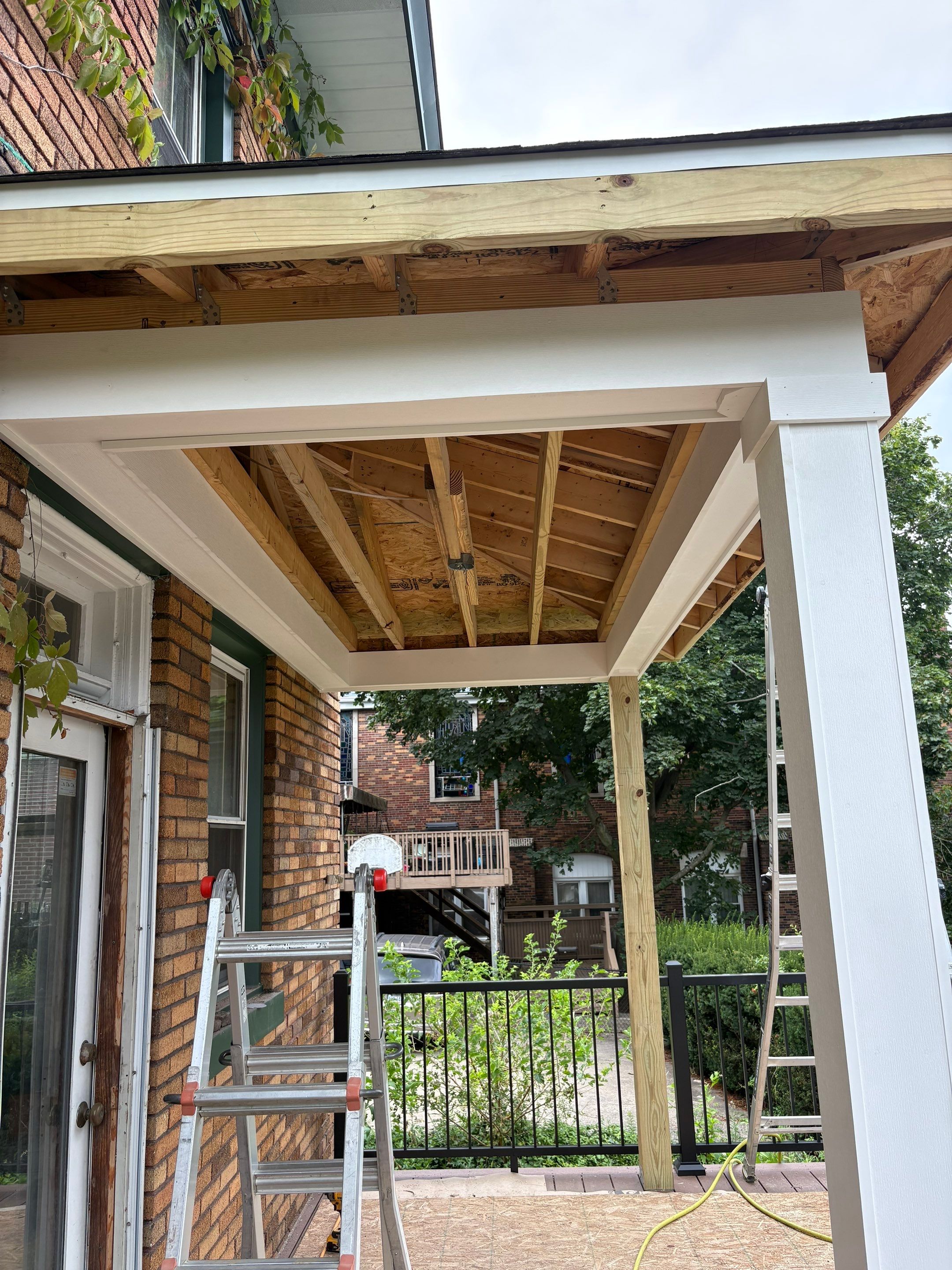 Deck and Roof build  by Cousins Roofing Siding & Decks