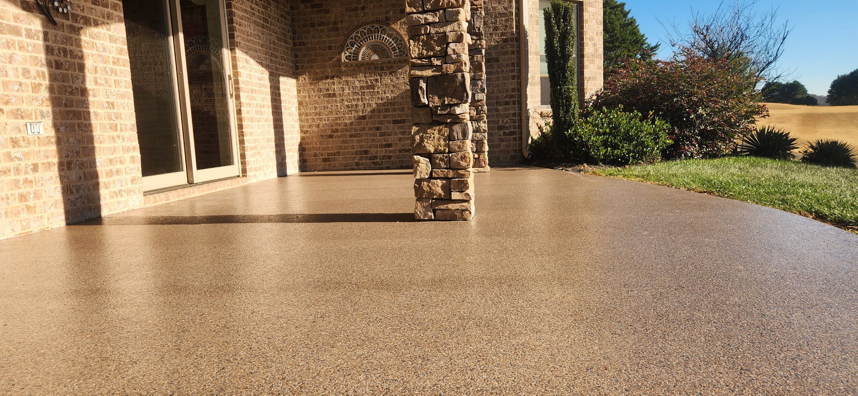 Garage & Back Patio Upgrade with Obsidian & Garnet by Elite Floor Solutions