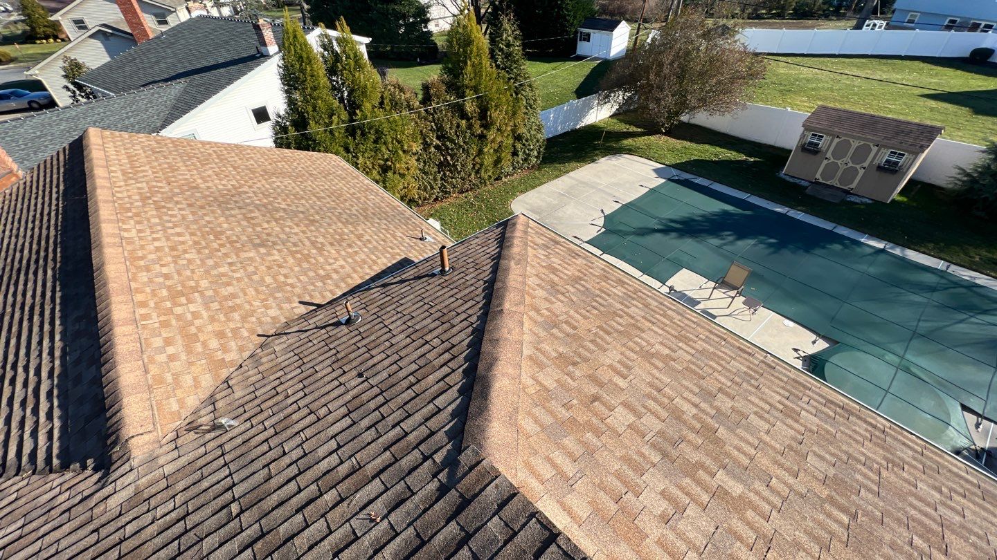 Onyx Black Shingles by Reimagine Roofing