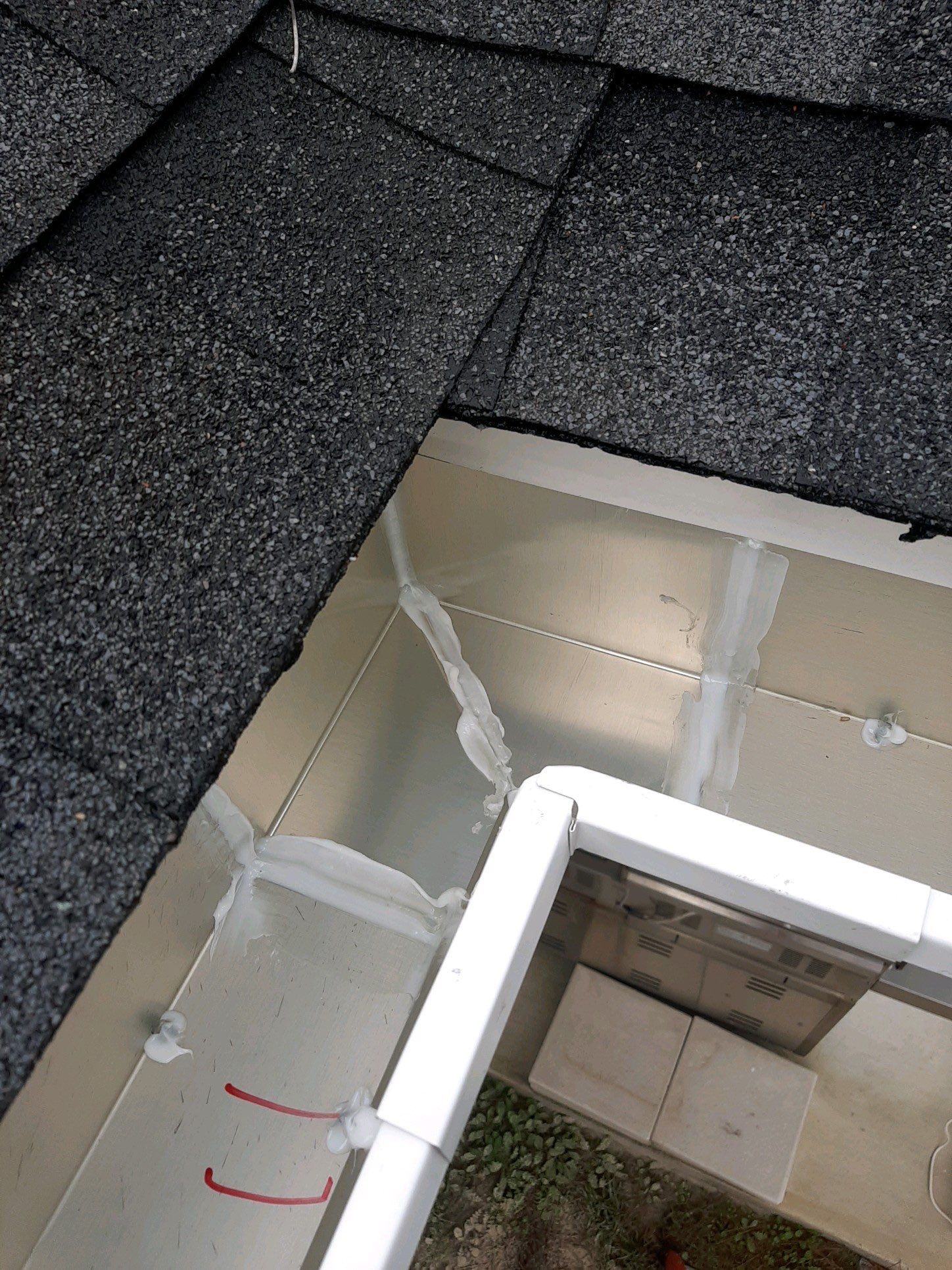 Gutter Installation using White K-Style Seamless Gutters by Gutter Professors