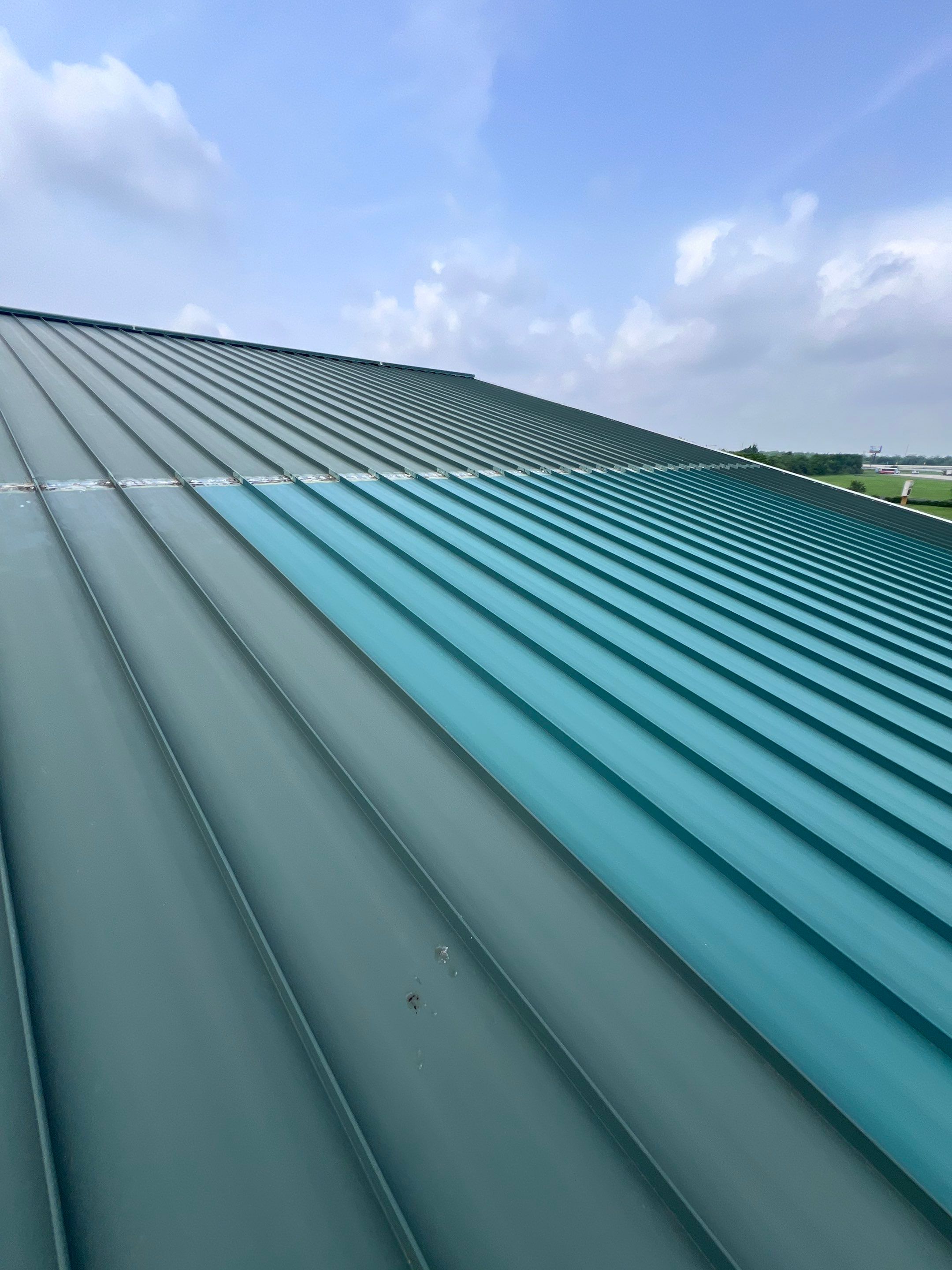 Hail Damage using Metal by Roof Repair Company
