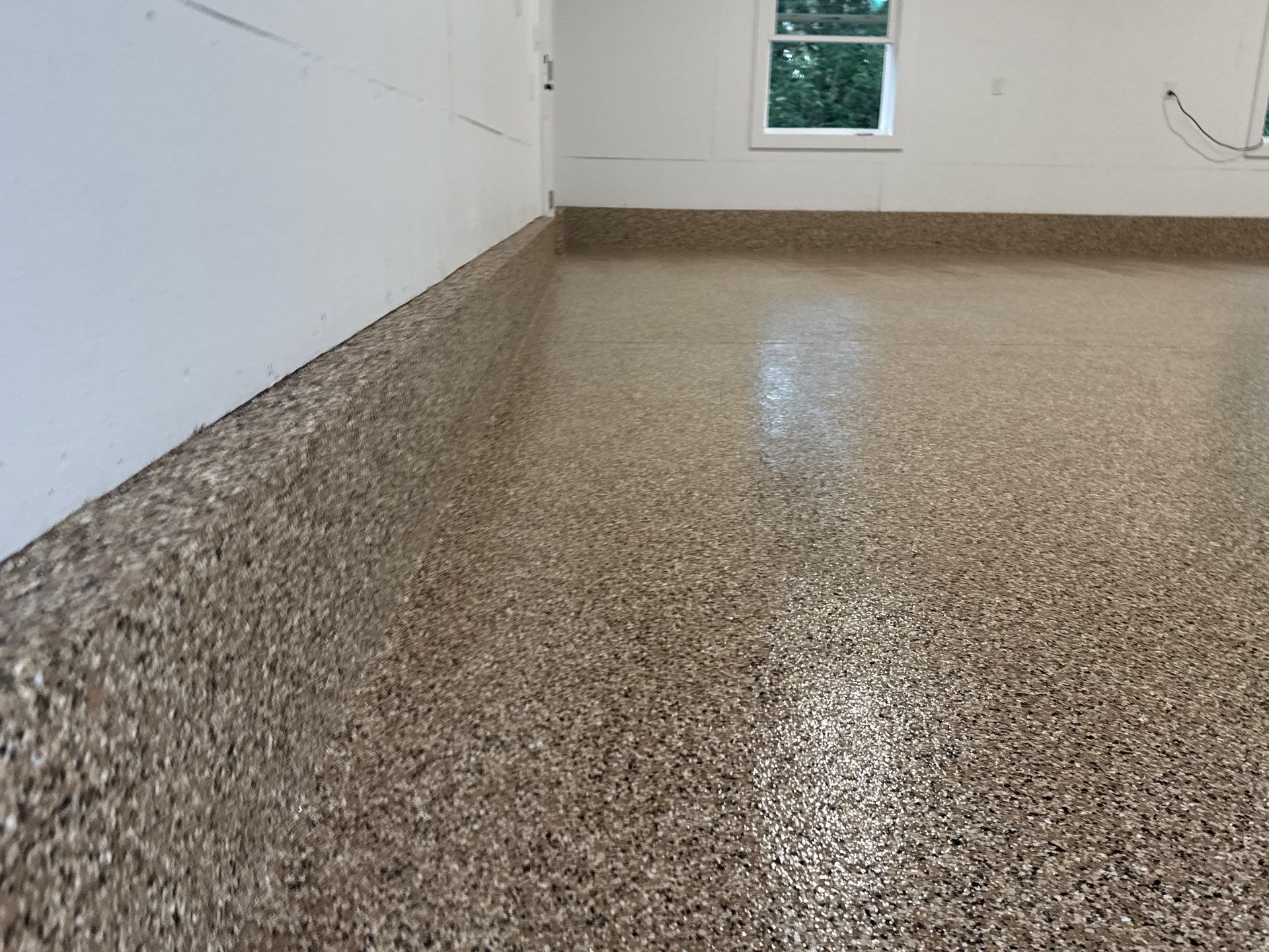 Garage in Gainesville, FL in Sandstone by Cross Creek Concrete Coatings