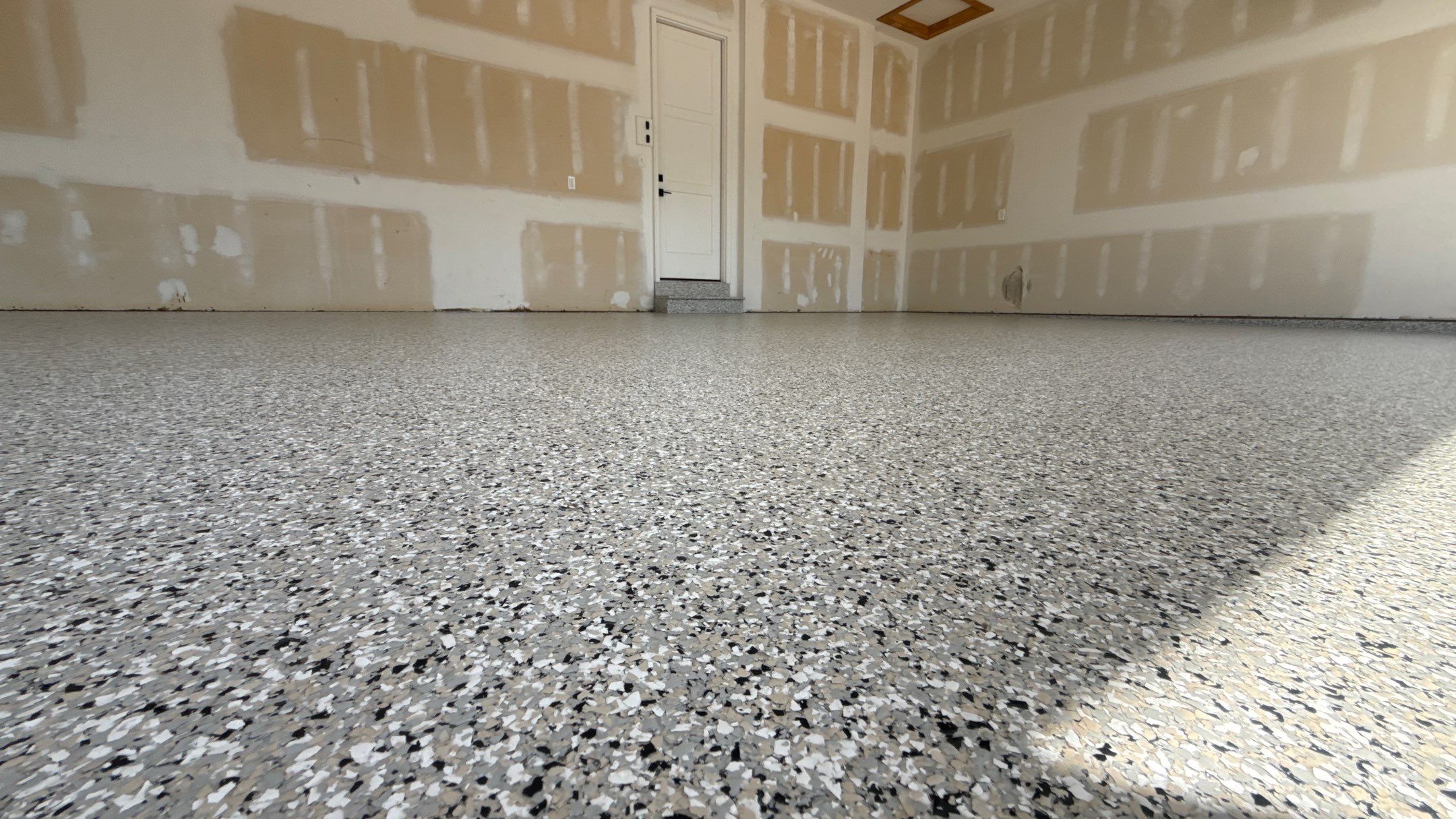 Comprehensive Garage Renovation Featuring Epoxy Flooring by Banner Garage