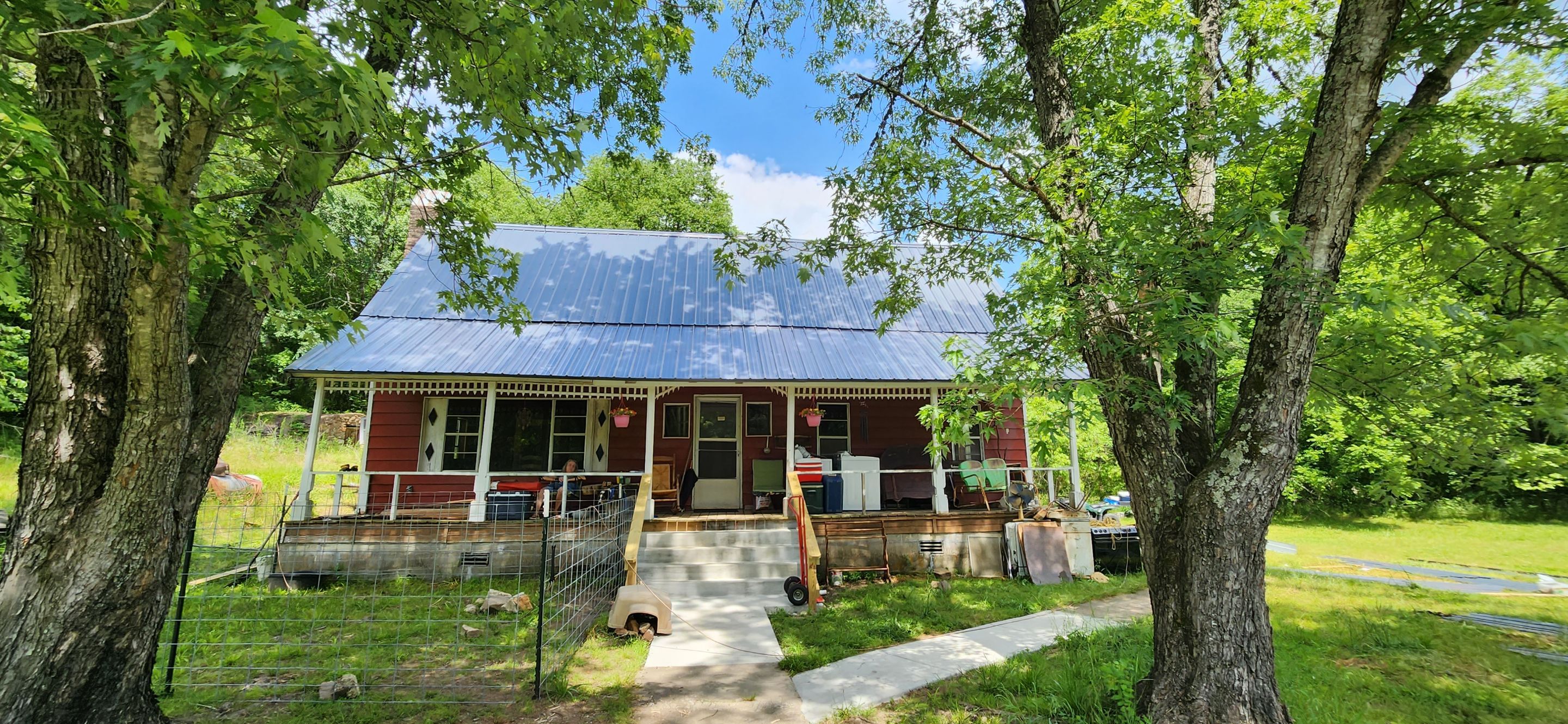 Residential Roofing Installation using 26 Gauge Colored Panels by Hostetler Roofing
