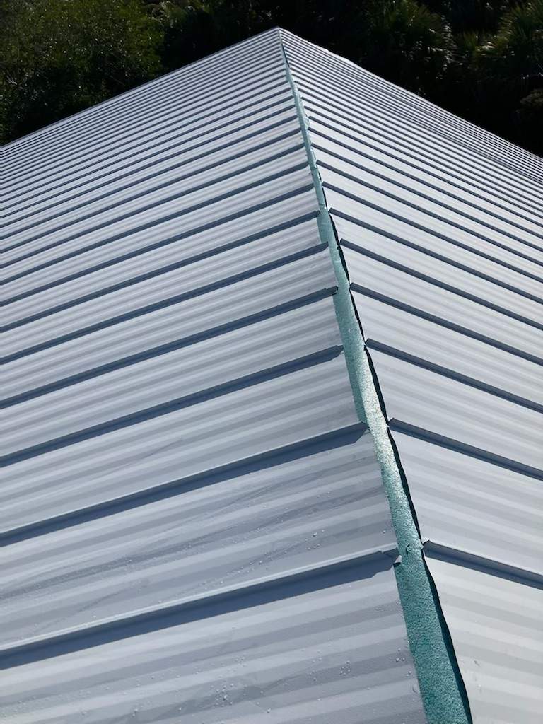Residential Roofing Installation using Gulf Coast Metals Gulf Seam Panels by Four Peaks Roofing
