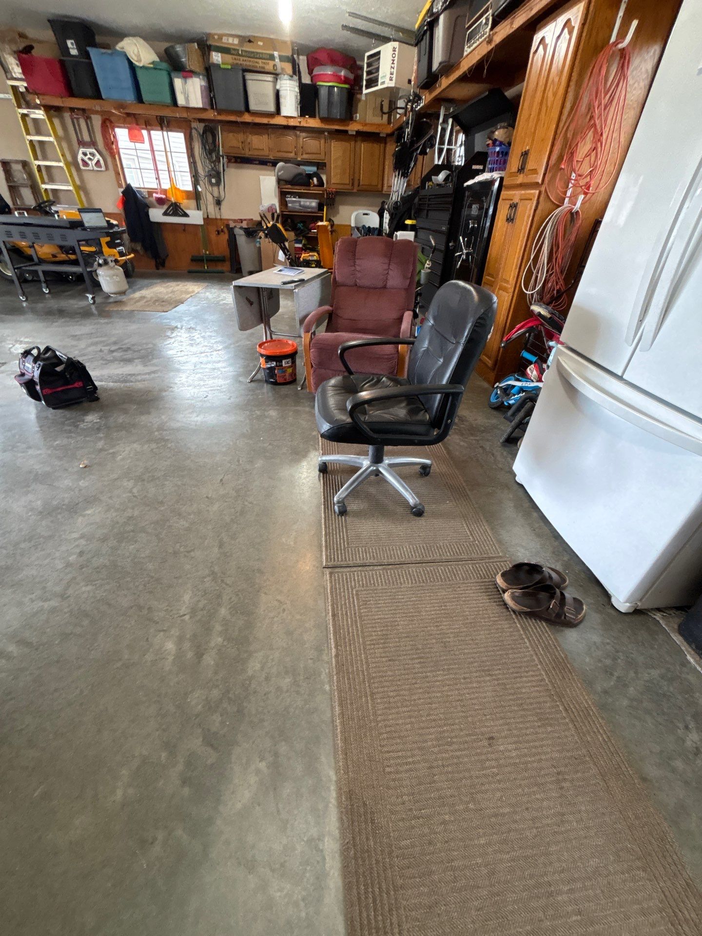 Multi-Fleck Epoxy Garage Floor Coating in Dell Rapids by Select Painting, Coatings & Garage Cabinets