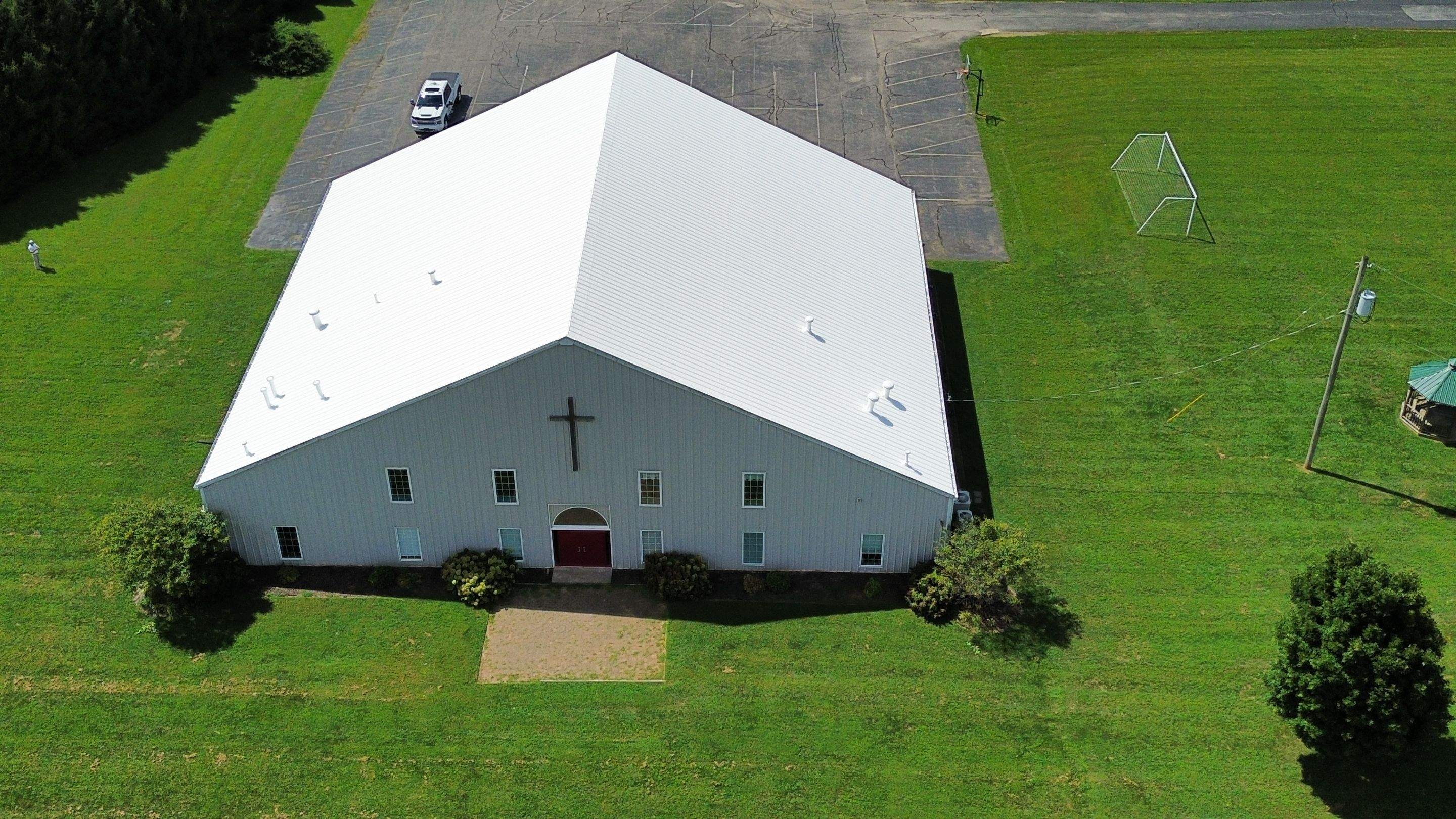 Metal Roof Restoration by Commercial Roofing Pros