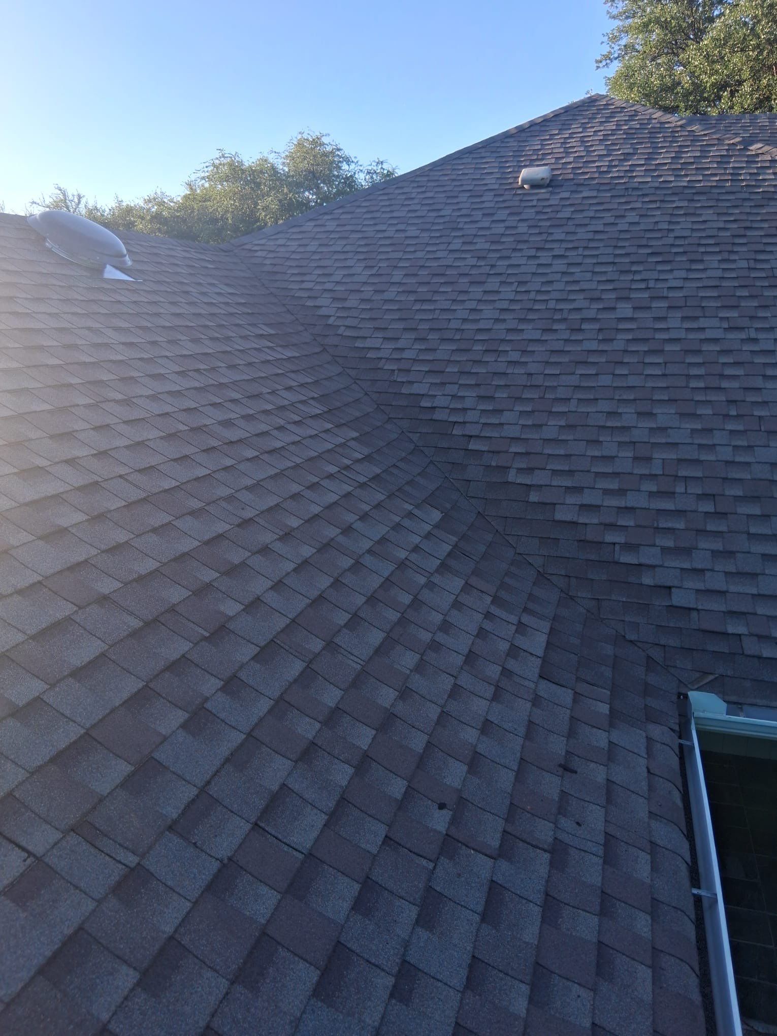 Project in Bedford  by Armor Roofing | Exteriors