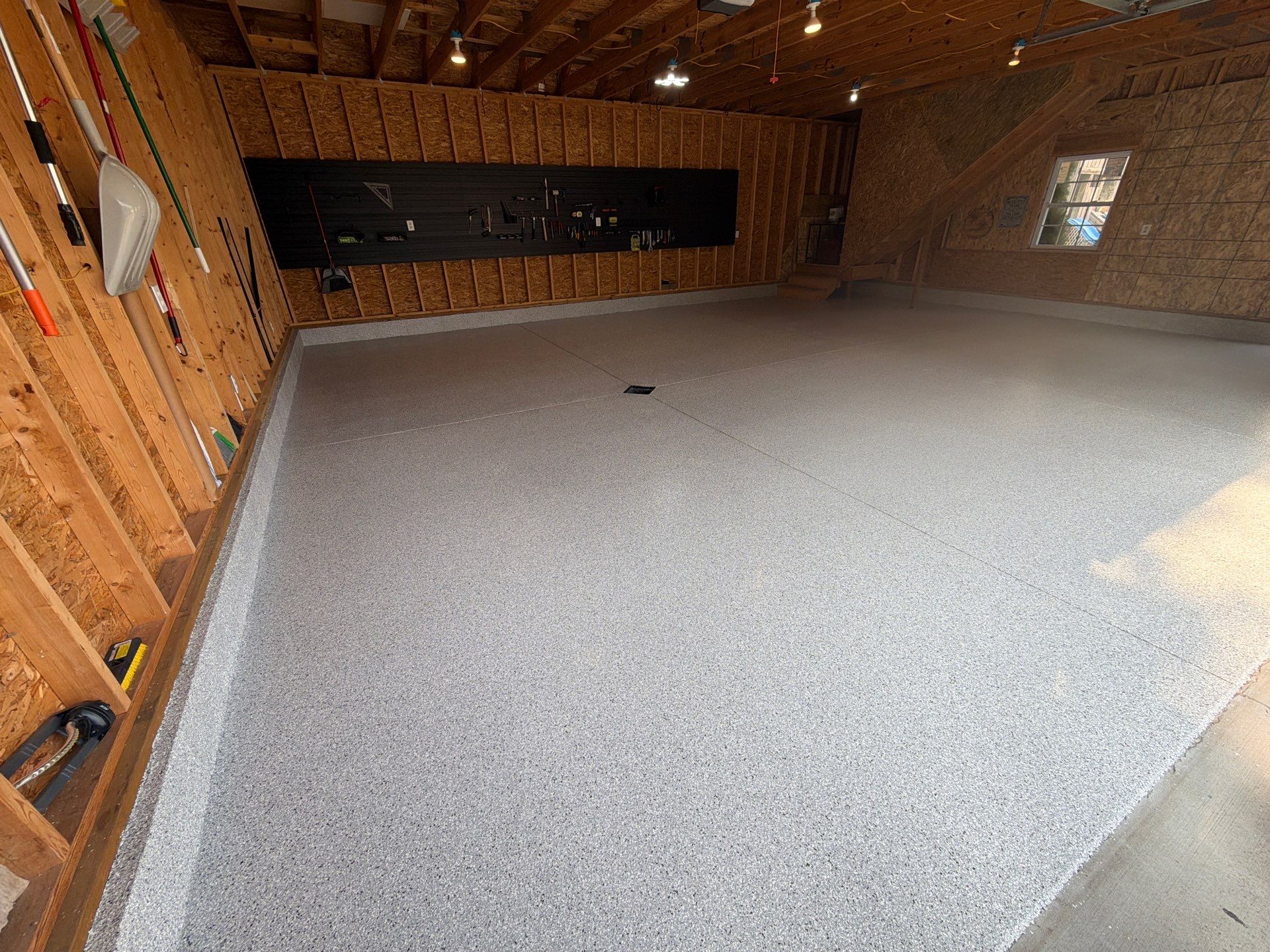 Custom Epoxy Flake Garage Floor Installation in Norton Shores by Gordon Painting