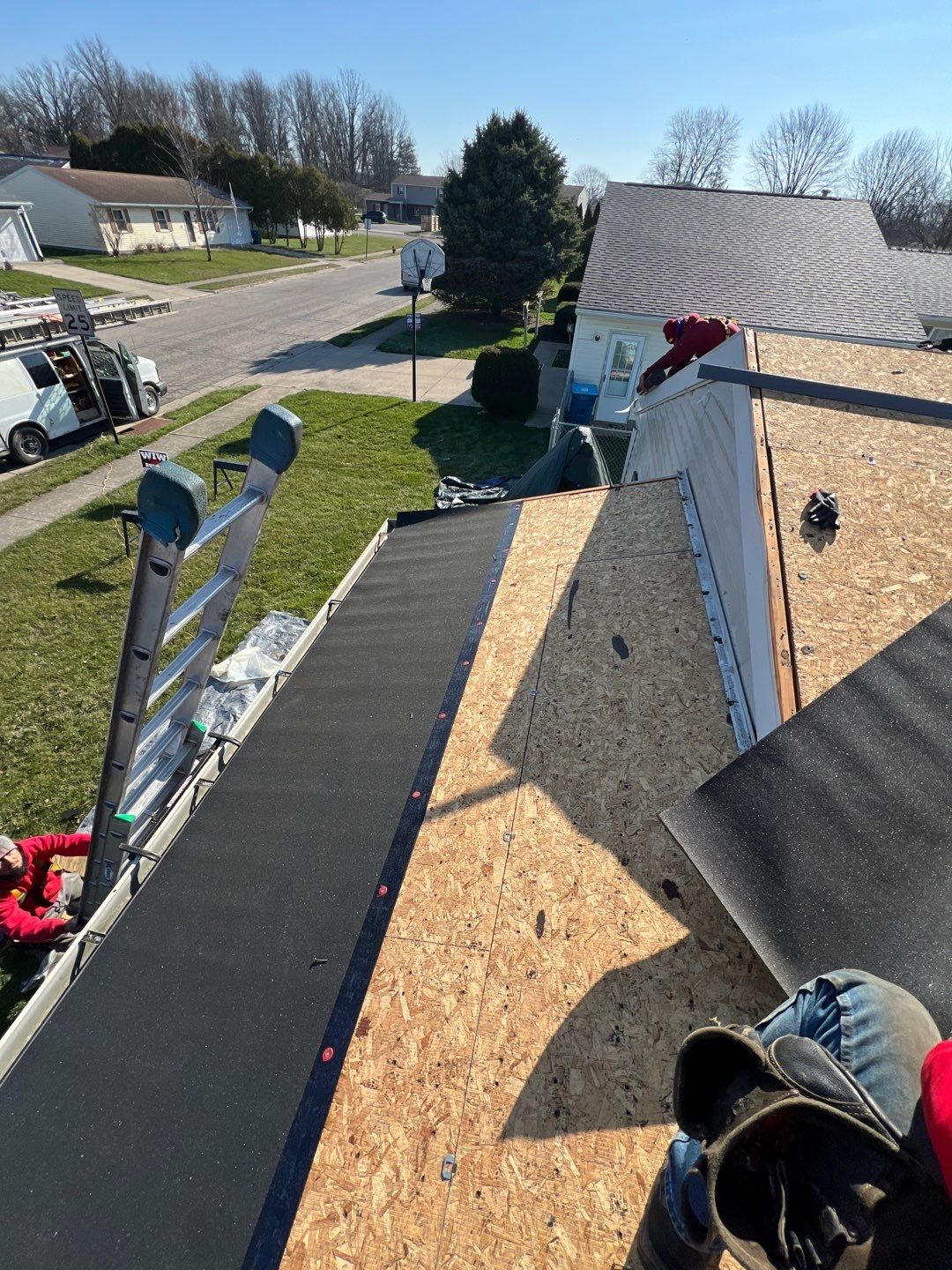 Storm Damage Residential Roof and Siding Installation by WIW Enterprises Inc