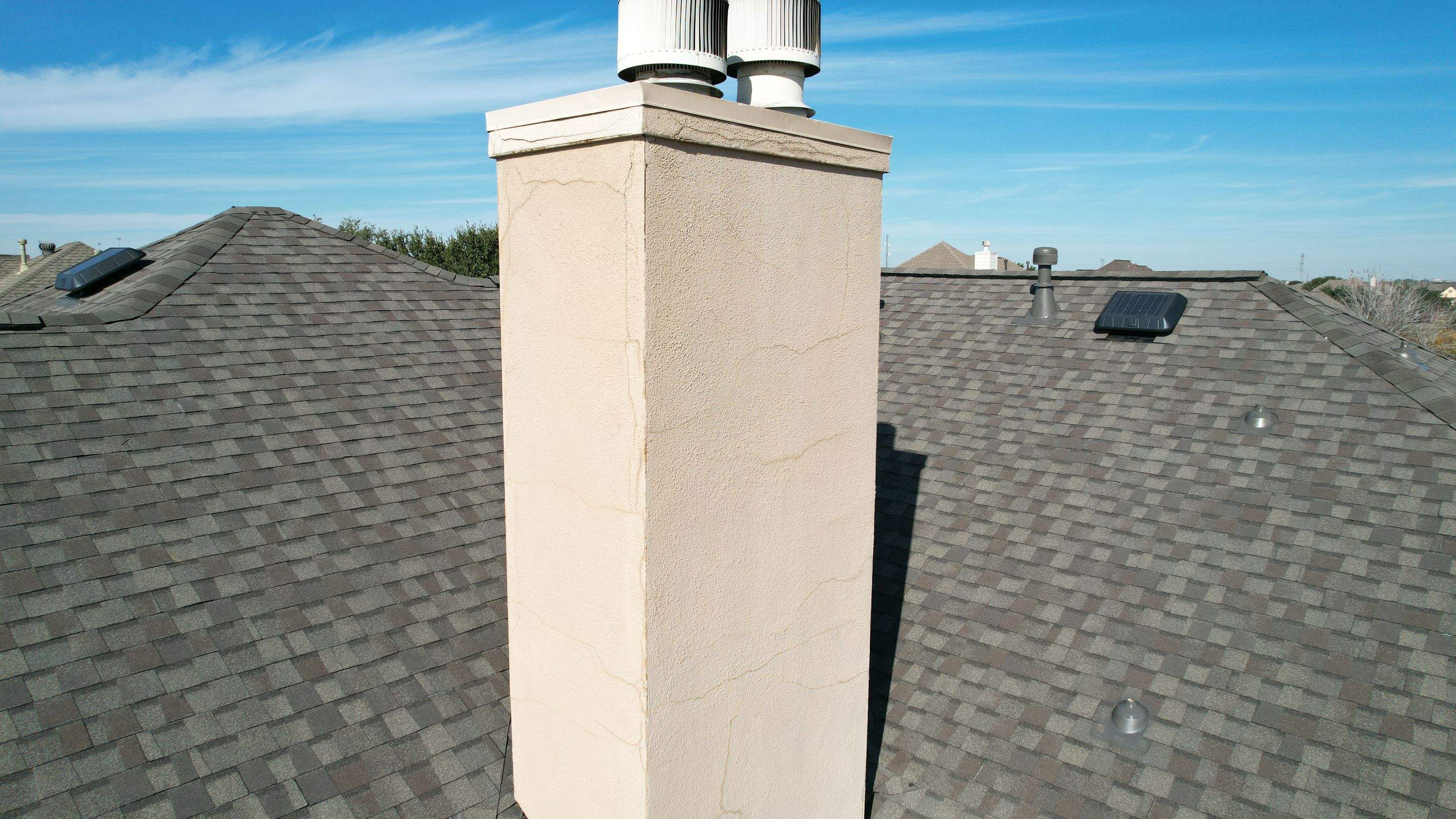 Two-Story Roof Replacement & Chimney Stucco Repair — Houston, TX by PL Roofing & SB Roofing, LLC.