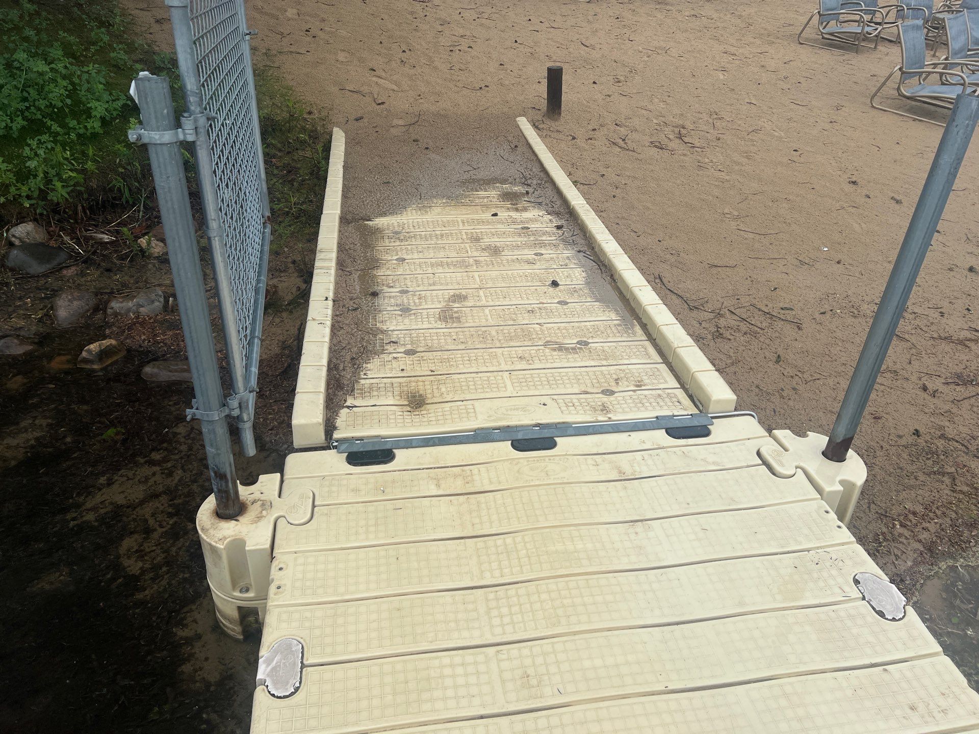 Power washing of floating dock by Northern Power Washing LLC.