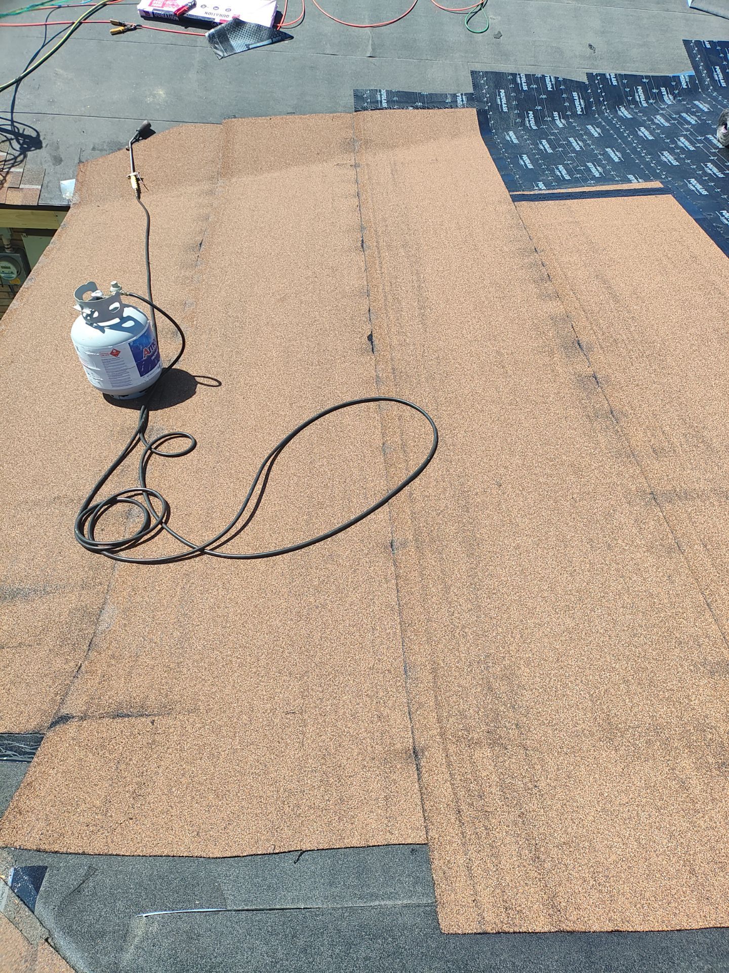 Cover that Patio! by Bayfront Roofing and Construction