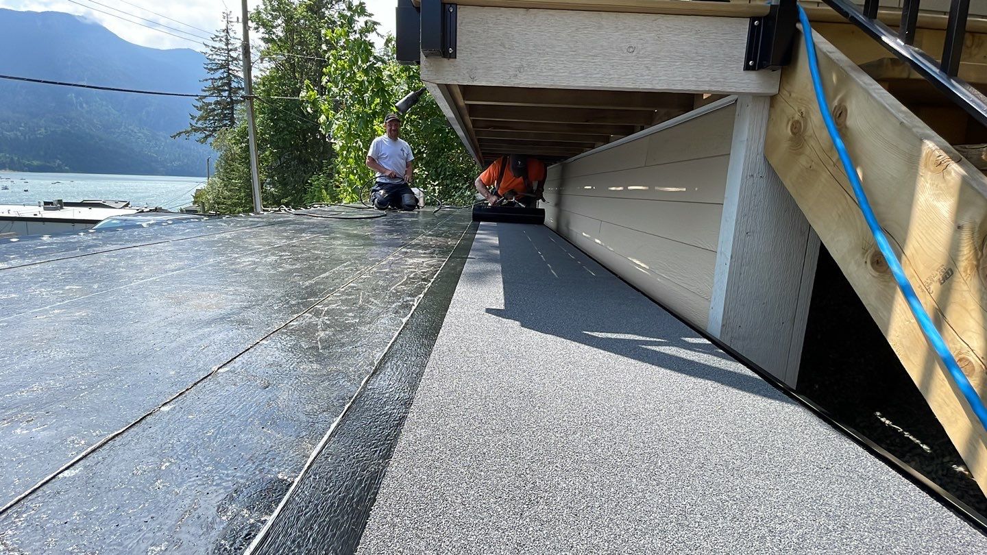 Small patio roof with 2ply sbs  by Top Notch Roofing Inc