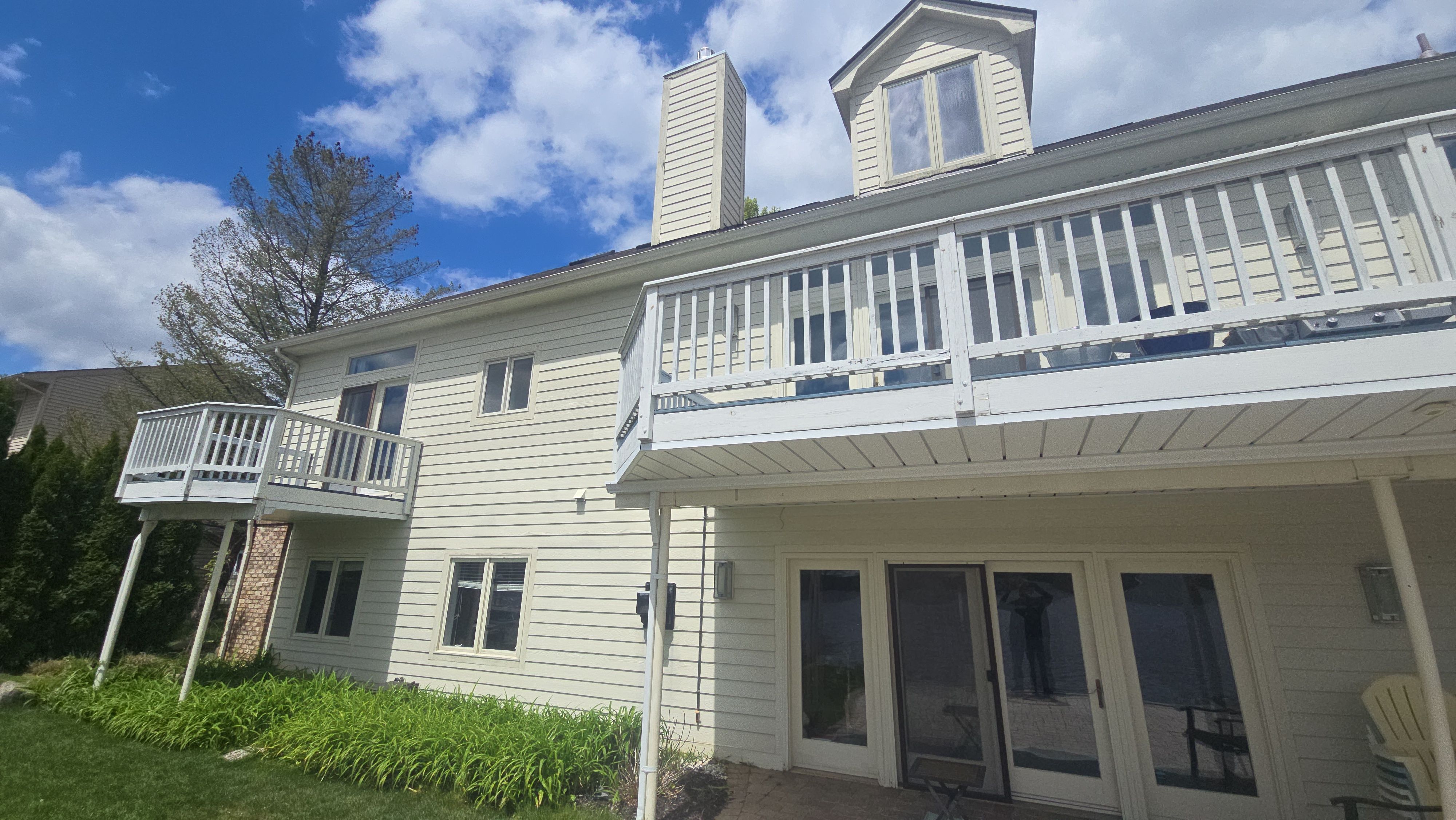 Exterior Wood Rot Repair and Trim Restoration in White Lake by Top Shelf Painter