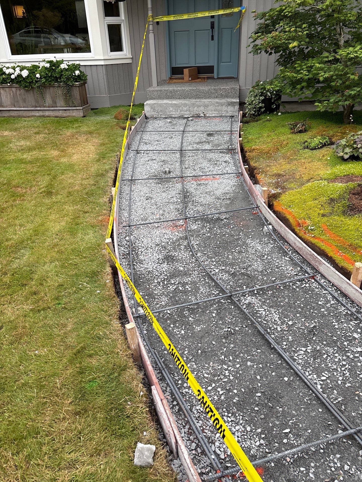 Exposed Aggregate Concrete Driveway Makeover  by Jireh Asphalt & Concrete Inc 