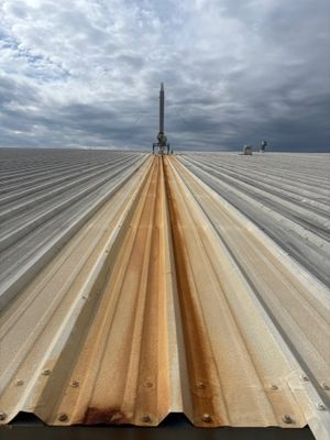 Wide angle view of a completed metal roof surface