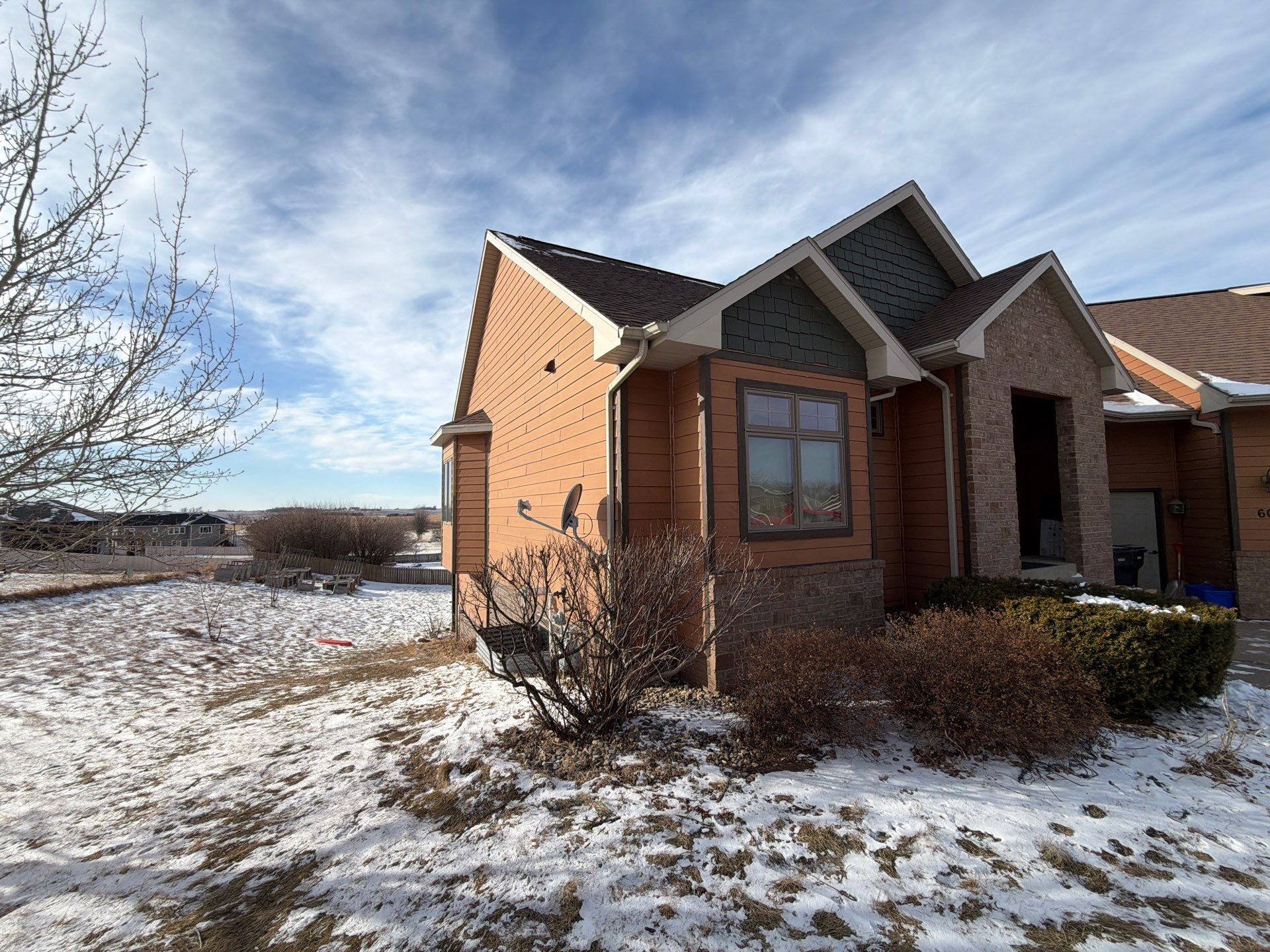 Residential Exterior Painting and Siding Restoration in Crooks by Select Painting, Coatings & Garage Cabinets