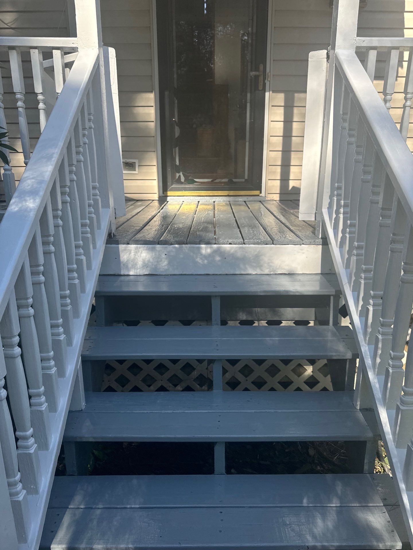 Deck staining by GonzalezPainters & Contractors Inc 