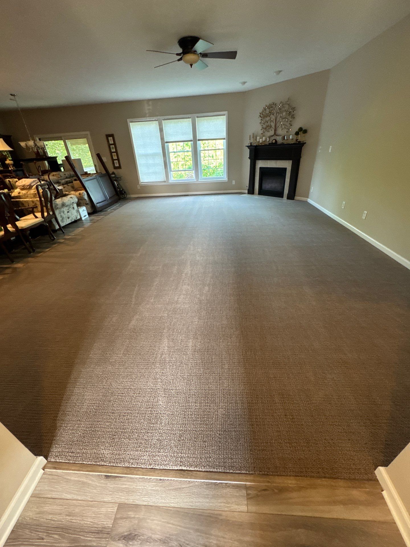 Full-Scale Fabrica Carpet and Luxury Vinyl Plank Installation in Indianapolis by Brothers Floor Covering INC.