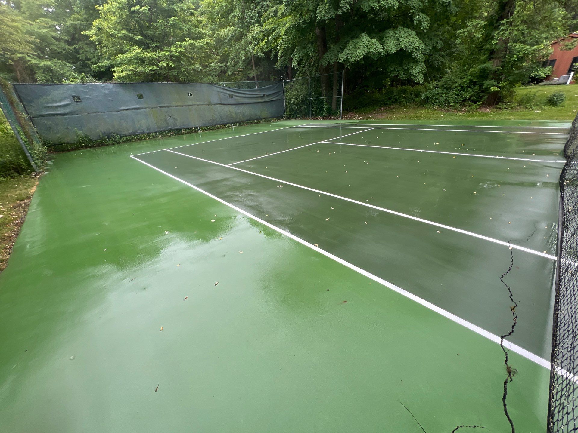 Deck, Patio, and Tennis Court Cleaning by Northern Power Washing LLC.
