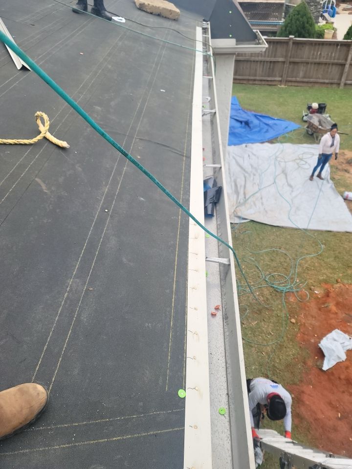 Residential Roofing Installation using Roof Replacement by American Roofing & Construction LLC