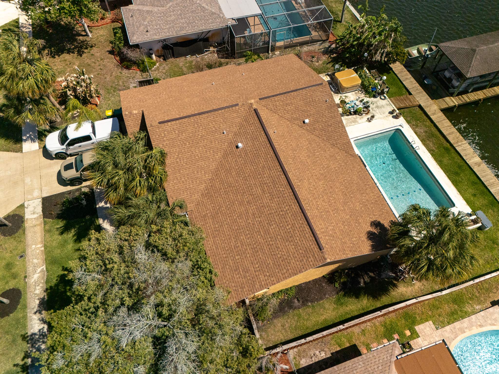 Merritt Island Architectural Asphalt Shingle Roof Replacement and Deck Repair by Wiedmann Construction & Roofing