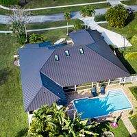24ga 1.5" Mechanical Seam Dark Bronze by Total Roofing System The Metal Roof Experts