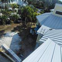 .032 Aluminum 1.5" Mechanical Seam Regal White  by Total Roofing System The Metal Roof Experts