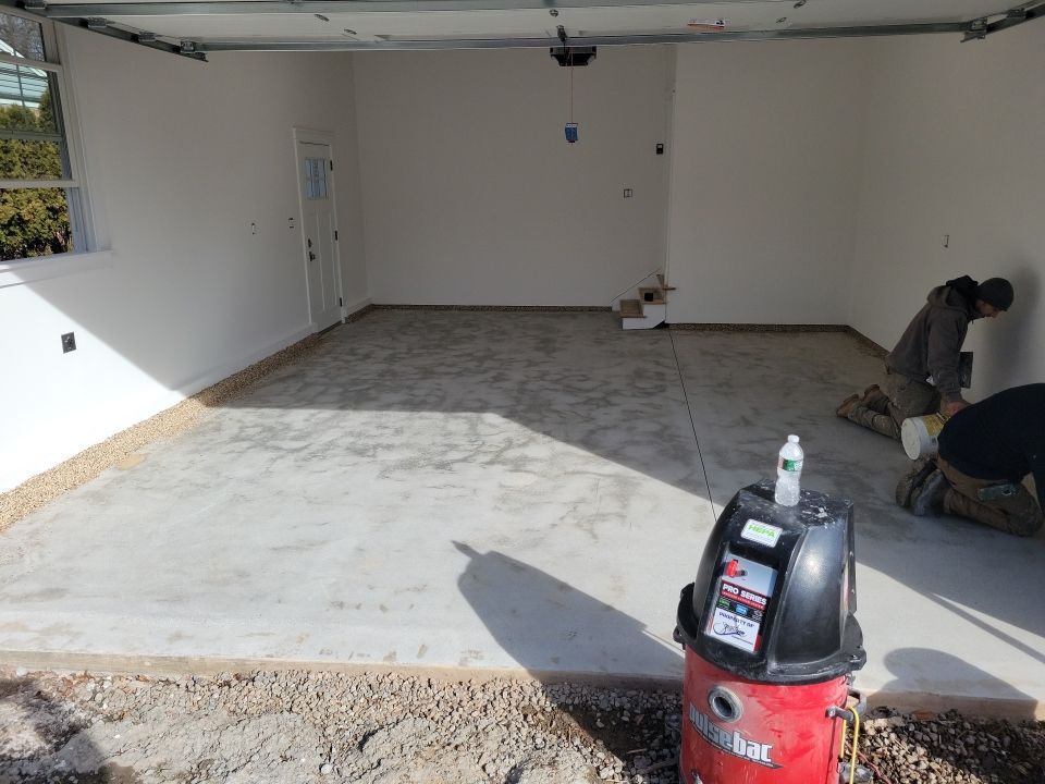 Garage Floor in Sandstone by Spectrum Painting, LLC