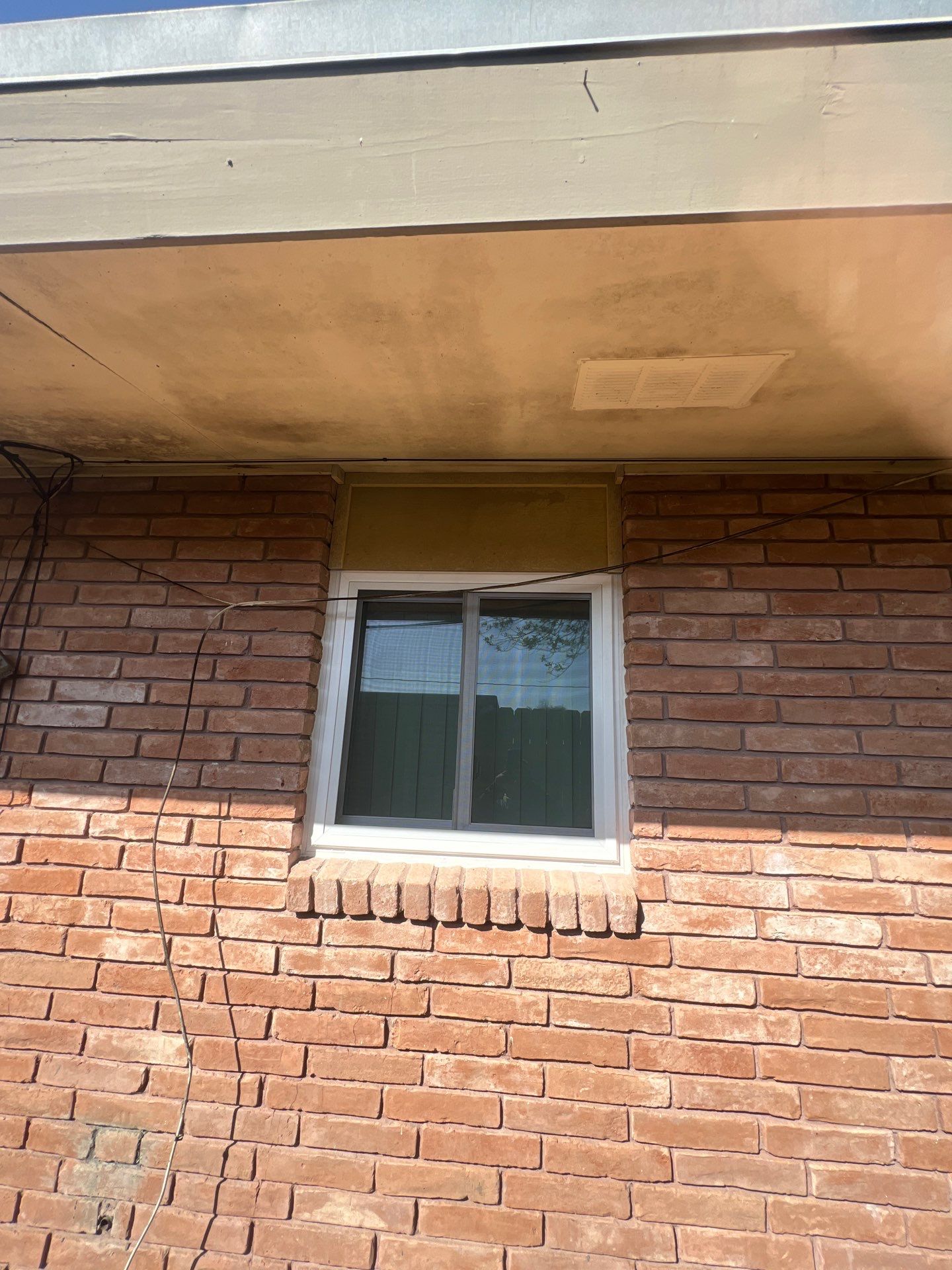 Windows in Brick with a Bay Window by Bayfront Roofing and Construction