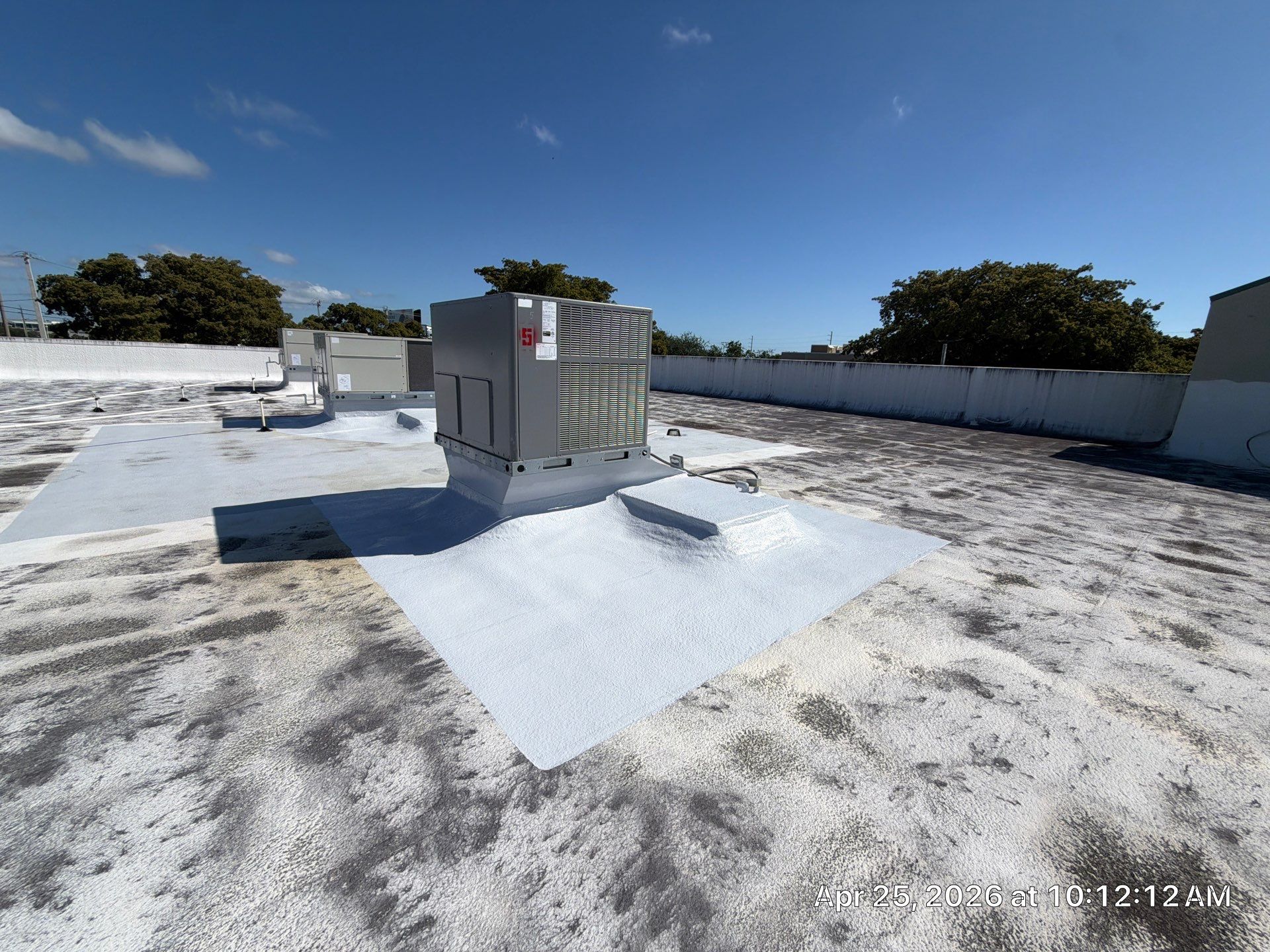 Commercial Flat Roof Restoration and Elastomeric Waterproofing in Delray Beach by Roof King LLC