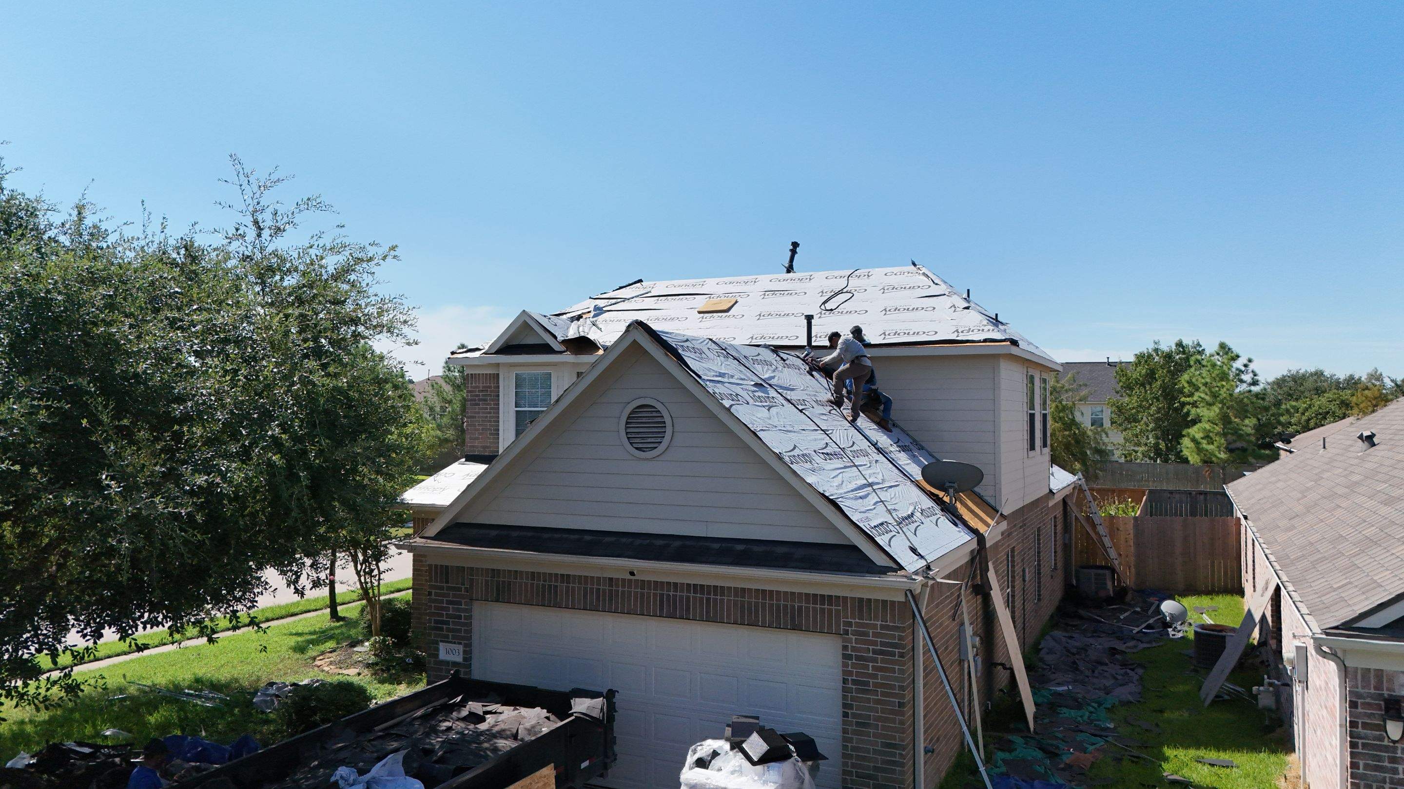 Full Roof Replacement in Warm Brown Tones — Spring, TX by PL Roofing & SB Roofing, LLC.