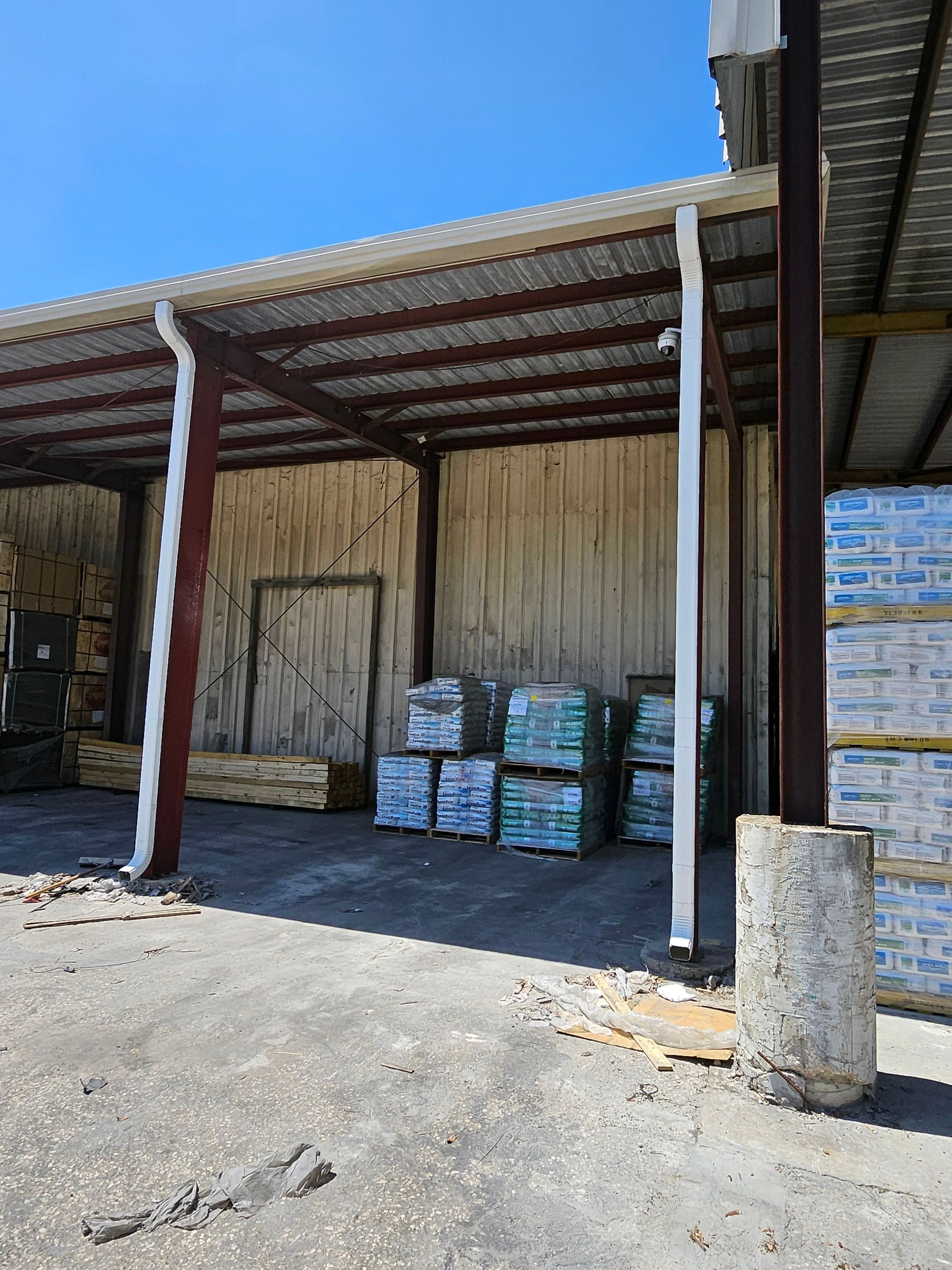 Commercial Box Gutters and White Downspouts Installation in Tampa FL by Gutter Professors